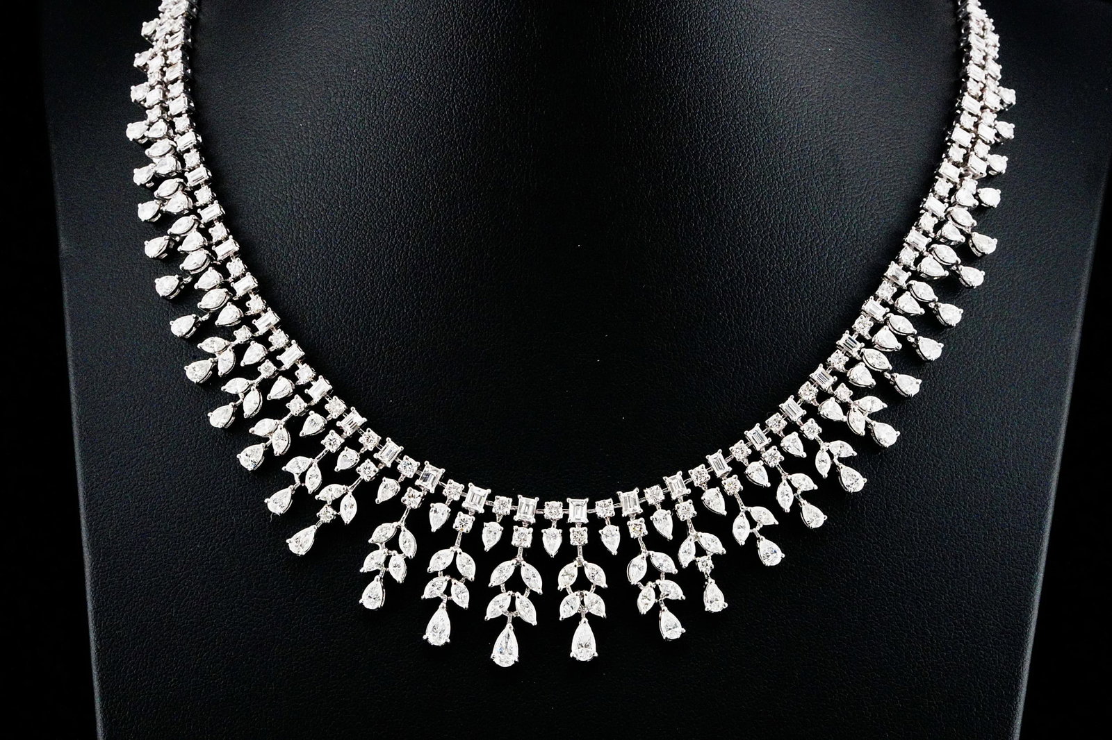 20.30ctw VS1-SI1/G-H Diamond and 18K 16" Necklace: 20.30ctw VS1-SI1/G-H Diamond and 18K White Gold 16" Fringe Necklace - THIS ITEM WILL COME WITH A $98,000 INSURANCE VALUATION REPORT. Exquisitely crafted in luxurious 18K white gold, this breathtaking 