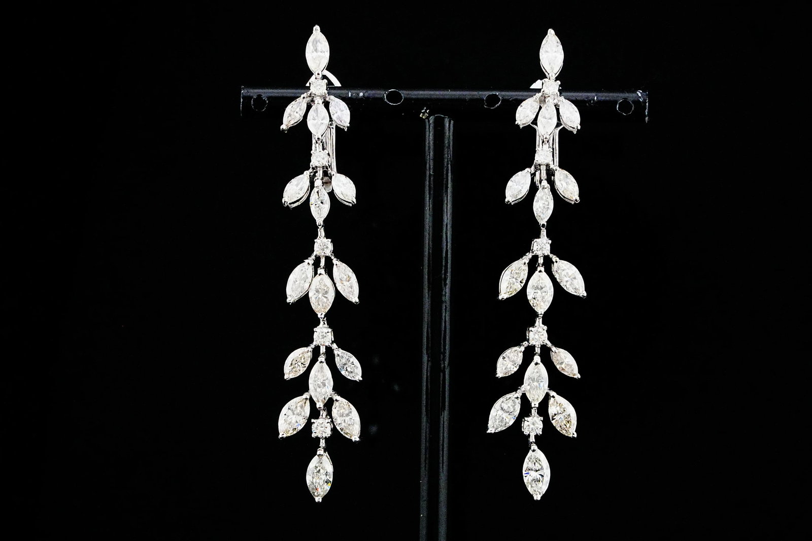 9.00ctw VS1-SI1/G-I Diamond and 18K 2.75" Earrings: 9.00ctw VS1-SI1/G-I Diamond and 18K White Gold 2.75" Dangle Earrings - THIS ITEM WILL COME WITH A $25,000 INSURANCE VALUATION REPORT. Exquisitely crafted in luxurious 18K white gold, these breathtakin