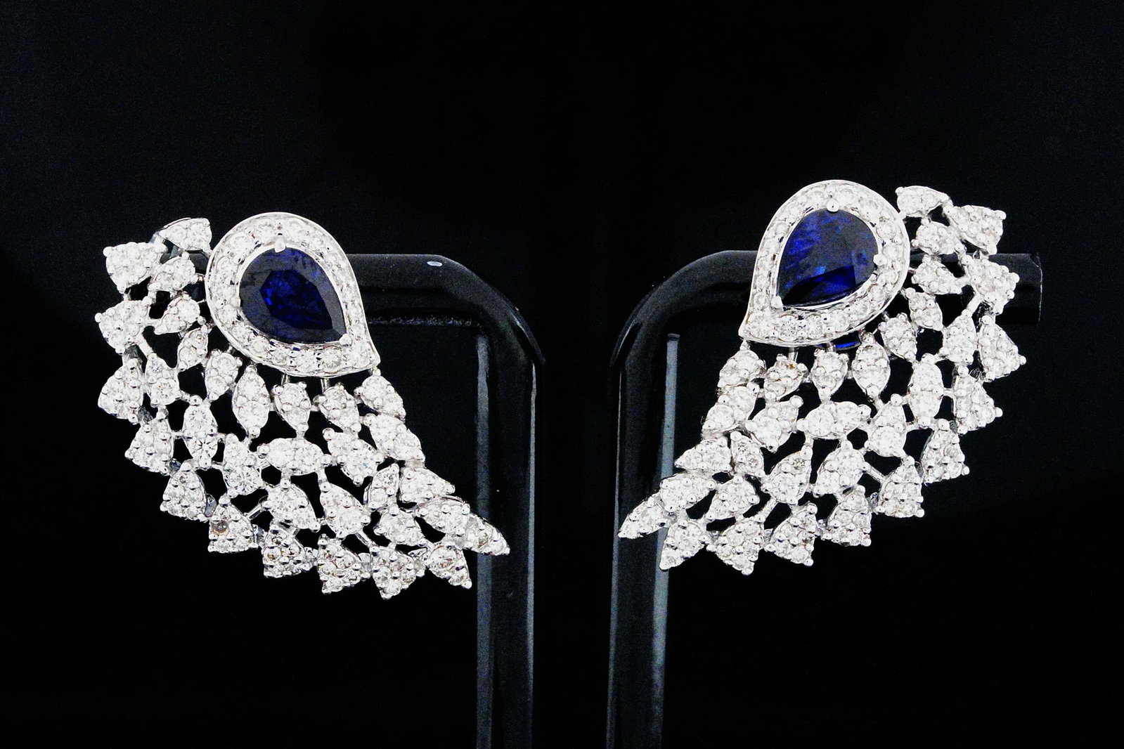2.90ctw Diamond, 2.60ctw Blue Sapphire and 18K Earrings: 2.90ctw VS1-SI1/G-H Diamond, 2.60ctw Blue Sapphire and 18K White Gold 1.35" Statement Earrings - THIS ITEM WILL COME WITH A $17,000 INSURANCE VALUATION REPORT. Exquisitely crafted in polished 18K whit
