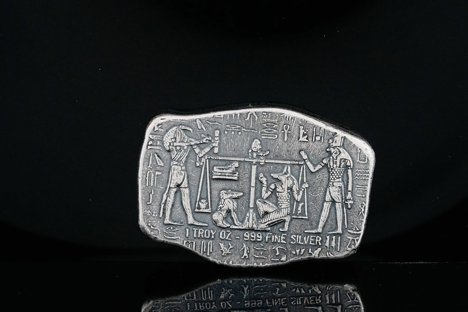 Monarch Precious Metals 1 Oz .999 Silver Egyptian Bar: Monarch Precious Metals 1 Troy Ounce .999 Fine Silver Old World Egyptian Anubis Relic Bar - This 1 troy ounce .999 fine silver bar by Monarch Precious Metals features an Egyptian-inspired design depic