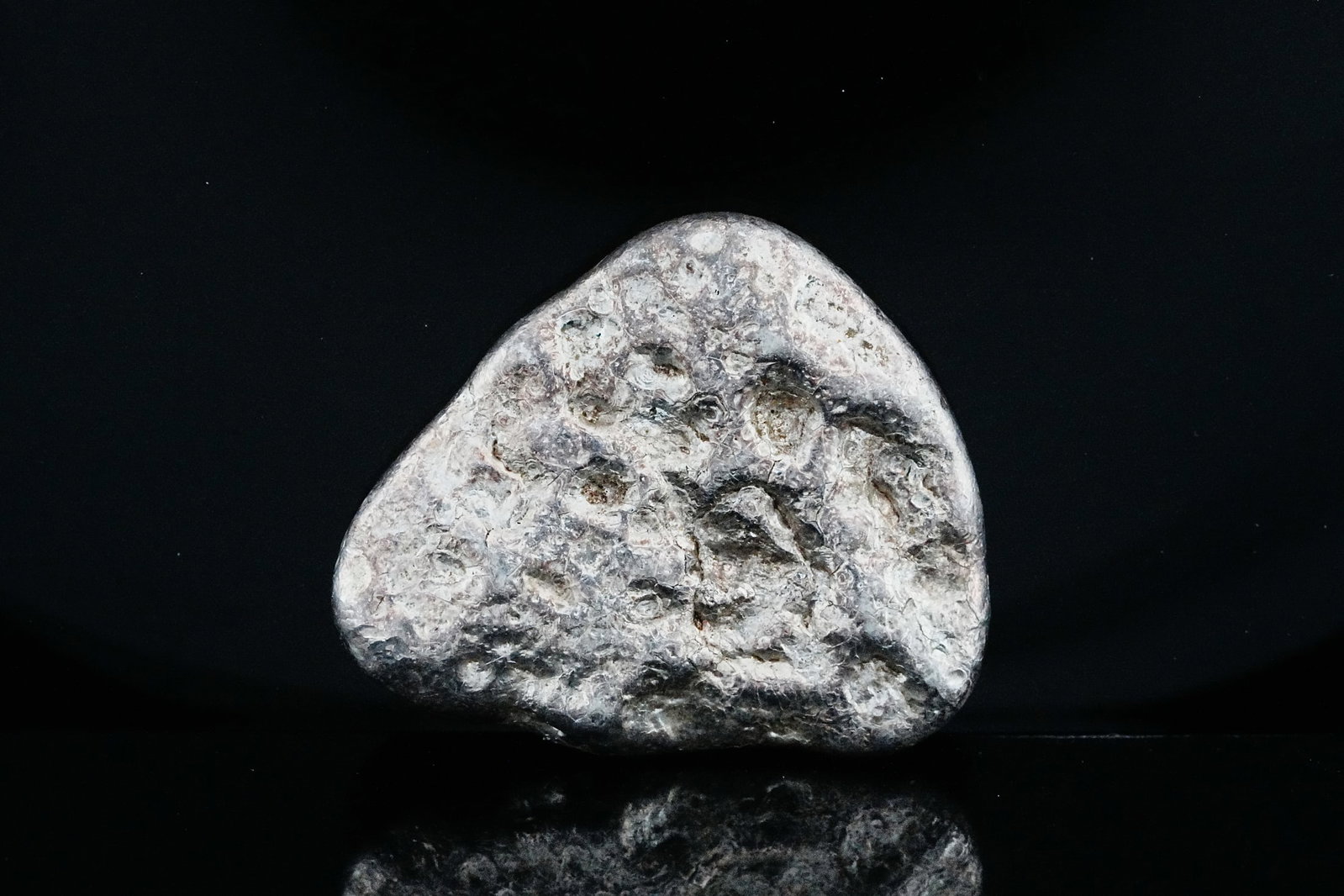 1.46 Troy Ounce .999 Fine Silver Hand-Poured Nugget: One-of-a-Kind 1.46 Troy Ounce .999 Fine Silver Hand-Poured Nugget - This unique one-of-a-kind silver nugget is crafted from 1.46 troy ounces of .999 fine silver in a freeform hand-poured design. Resem