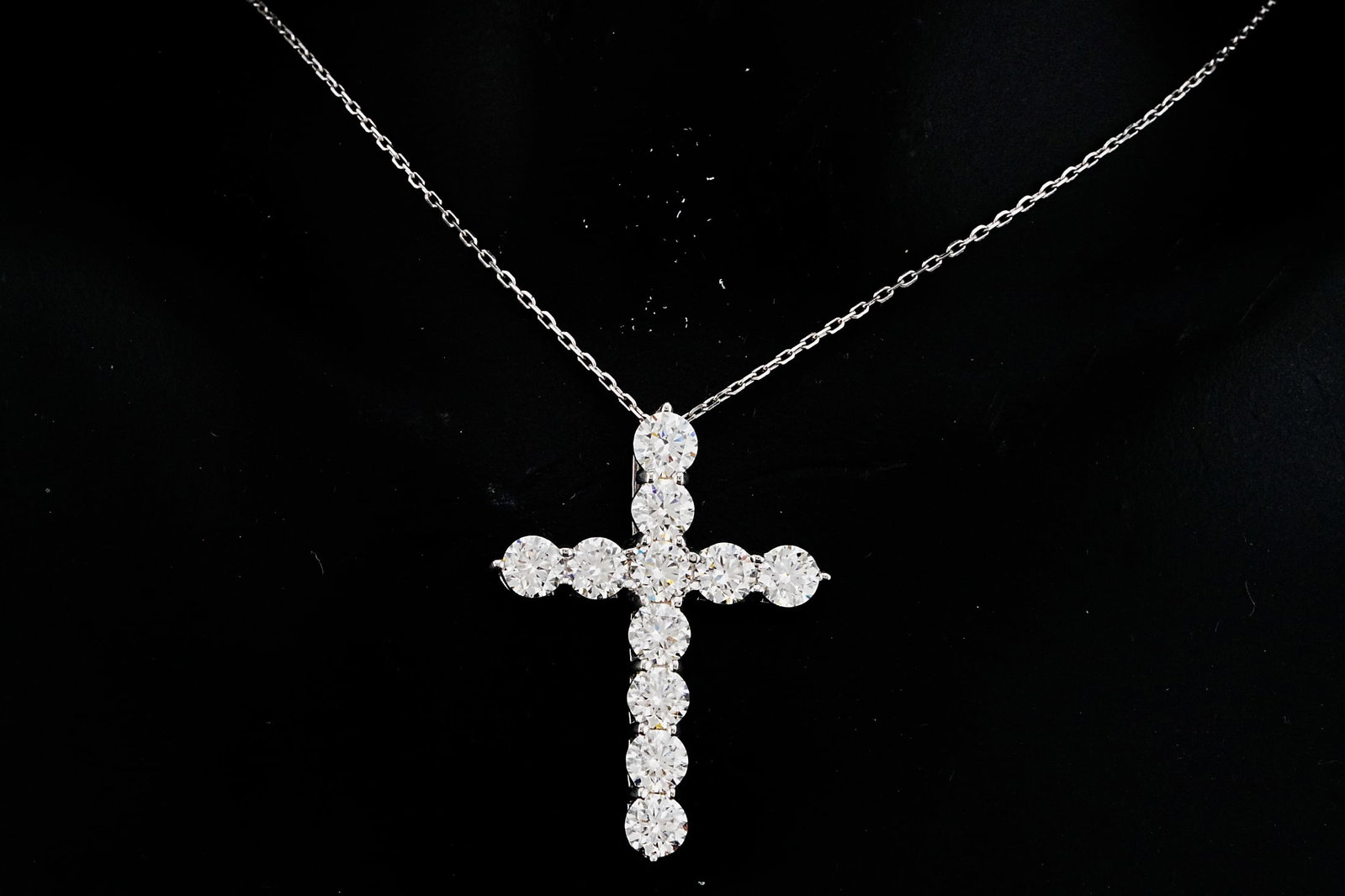 4.35ctw VS2-SI1/G-H Diamond and 14K 19" Cross Necklace: 4.35ctw VS2-SI1/G-H Diamond and 14K White Gold 19" Cross Pendant Necklace - THIS ITEM WILL COME WITH A $14,500 INSURANCE VALUATION REPORT. Expertly crafted in polished 14K white gold, this striking ne