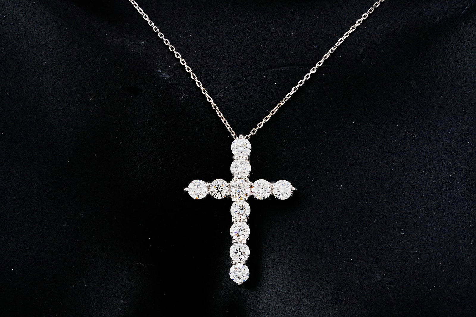 2.10ctw VS2-SI1/G-H Diamond and 14K 19" Cross Necklace: 2.10ctw VS2-SI1/G-H Diamond and 14K White Gold 19" Cross Pendant Necklace - THIS ITEM WILL COME WITH AN $8,500 INSURANCE VALUATION REPORT. Elegantly crafted in polished 14K white gold, this timeless n