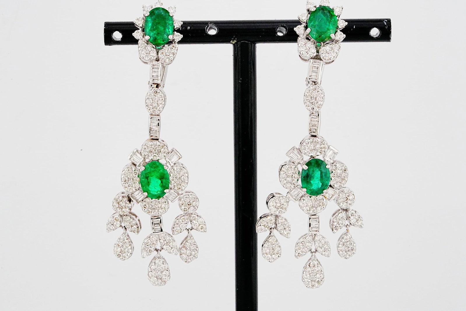 5.00ctw Emerald, 3.40ctw Diamond and 18K 2.5" Earrings: 5.00ctw Emerald, 3.40ctw VS2-SI1/G-H Diamond and 18K White Gold 2.5" Chandelier Earrings - THIS ITEM WILL COME WITH A $23,000 INSURANCE VALUATION REPORT. Exquisitely crafted in luxurious 18K white gol