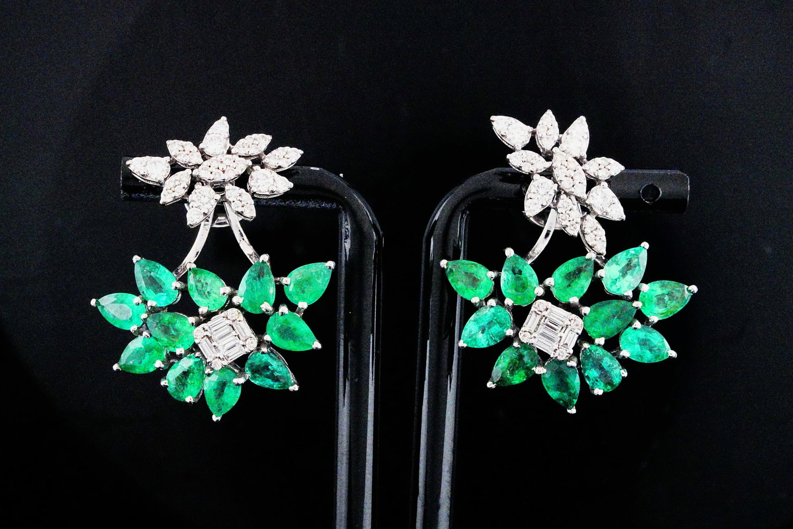 8.35ctw Emerald, 1.50ctw Diamond and 18K Earrings: 8.35ctw Emerald, 1.50ctw VS1-SI1/G-H Diamond and 18K White Gold Convertible Jacket Earrings - THIS ITEM WILL COME WITH A $20,500 INSURANCE VALUATION REPORT. An exceptionally versatile and sophisticate