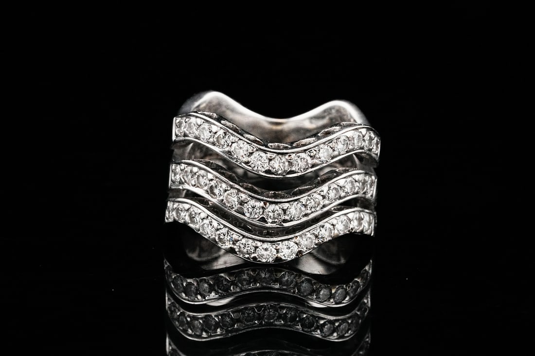 18K White Gold and 0.80ctw Diamond 12mm Wide Wave Band: 18K White Gold and 0.80ctw SI1-SI2/G-H Diamond 12mm Wide Wave Band - A bold and contemporary statement of refined luxury, this 18K white gold band showcases approximately 0.80 carat total weight of br
