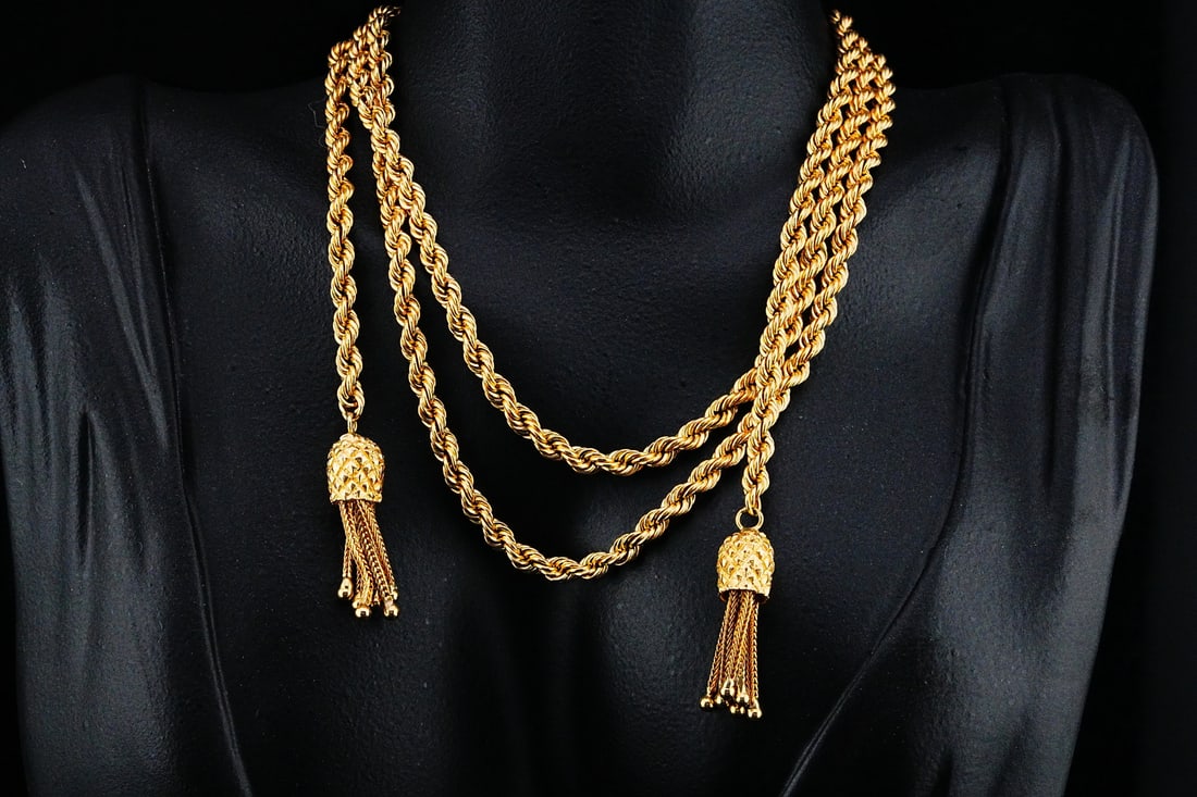 Solid 14K Yellow Gold 4mm Thick 38" Rope Necklace: Solid 14K Yellow Gold 4mm Thick 38" Rope Necklace W/Tassel Ends - This striking necklace embodies effortless luxury with a bold, fluid silhouette. Crafted from solid 14K yellow gold, the richly textur