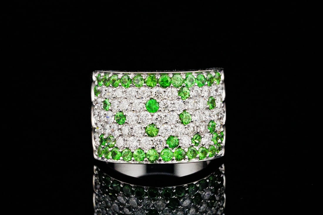 1.40ctw Diamond, 1.15ctw Tsavorite and 14K Ring: 1.40ctw SI1-SI2/G-H Diamond, 1.15ctw Tsavorite Garnet and 14K White Gold 14mm Wide Ring - This bold and luxurious ring makes an unforgettable statement with its vibrant display of color and brilliance
