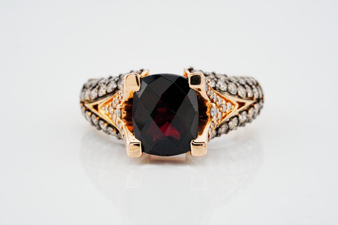 Le Vian 3.00ct Garnet, 1.25ctw Diamond and 14K Ring: Le Vian 3.00ct Garnet, 1.25ctw Diamond and 14K Rose Gold Ring - This luxurious Le Vian ring is a bold expression of rich color and refined craftsmanship. At its center, a 3.00 carat garnet is expertly