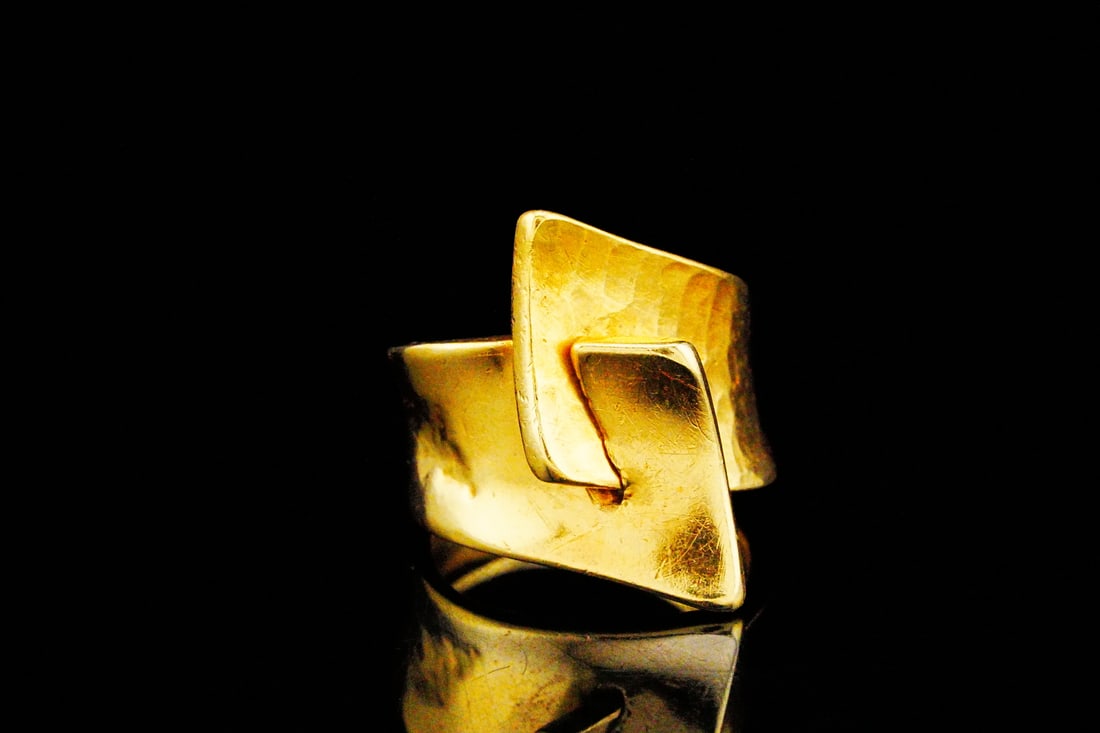 Italian Solid 18K Yellow Gold Geometric Ring: Italian Solid 18K Yellow Gold Geometric Ring - This bold Italian-crafted ring is a striking example of modern design and exceptional goldwork. Sculpted from rich 18K yellow gold, the piece features an