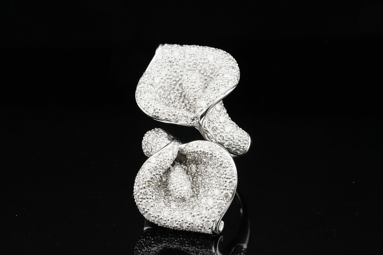 5.75ctw VS2-SI1/G-H Diamond and 18K Calla Lily Ring: 5.75ctw VS2-SI1/G-H Diamond and 18K White Gold Calla Lily Bypass Ring - Elegantly sculptural and radiant with brilliance, this striking bypass ring is crafted in luxurious 18K white gold and designed 