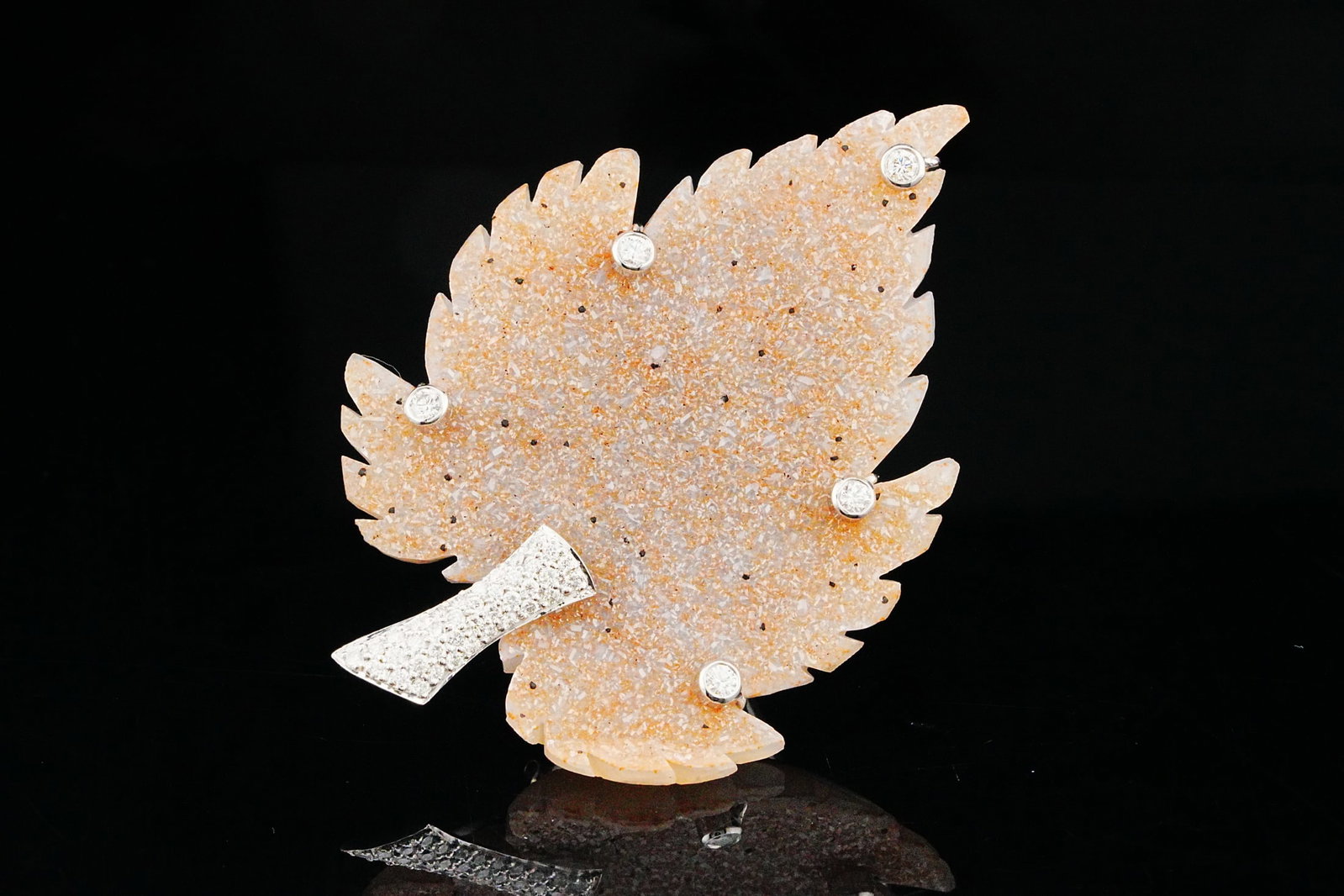 1.00ctw Diamond, Carved Druzy and 18K 2.5" Leaf Brooch: 1.00ctw SI1-SI2/G-H Diamond, Carved Druzy Quartz and 18K White Gold 2.5" Leaf Brooch - A striking naturalistic brooch crafted in 18K white gold and designed in the form of a sculpted leaf. The centerp