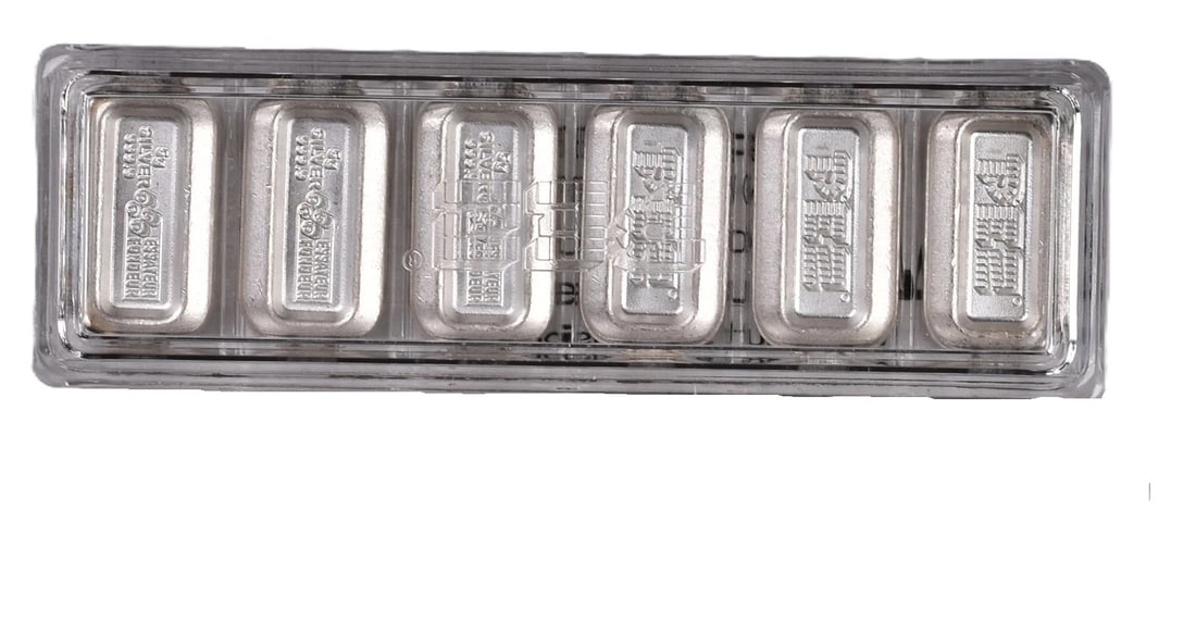 PAMP Suisse Set of (6) 5 Gram .999 Silver PEZ Bars: PAMP Suisse Set of (6) 5 Gram .999 Fine Silver PEZ Wafer Bars - A unique and highly collectible bullion novelty, this PAMP Suisse PEZ wafer set blends fine silver investment appeal with nostalgic pop 