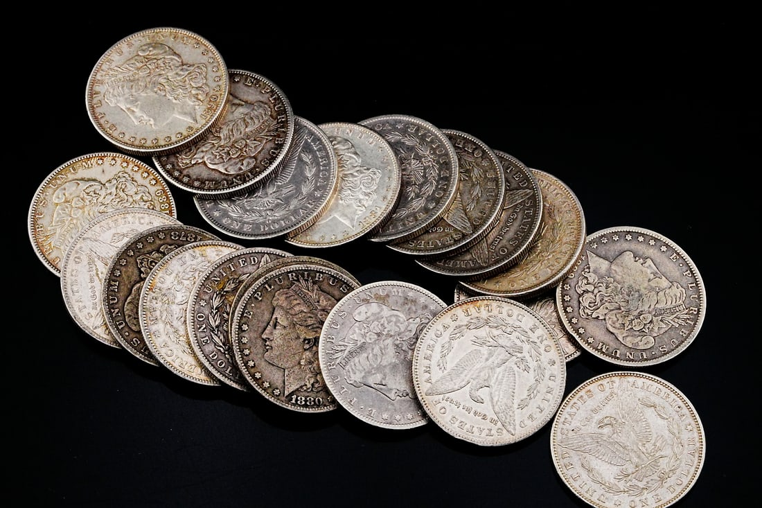 Lot of (40) Unsearched 90% Silver Morgan Dollars: Lot of (40) Unsearched 90% Silver Morgan Dollars (532.1 Grams) - Offered here is an impressive group of (40) genuine Morgan Silver Dollars, each struck in 90% silver and representing one of the most i