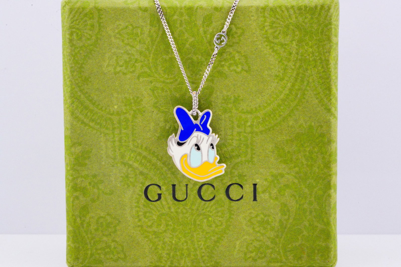 Gucci x Disney Daisy Duck Necklace (Sold Out): Gucci x Disney Limited Edition Daisy Duck Sterling Silver and Enamel Necklace Unworn W/Pouch, Box (Sold Out) - This rare piece blends the timeless and playful aura of Disney with the sought after Ital
