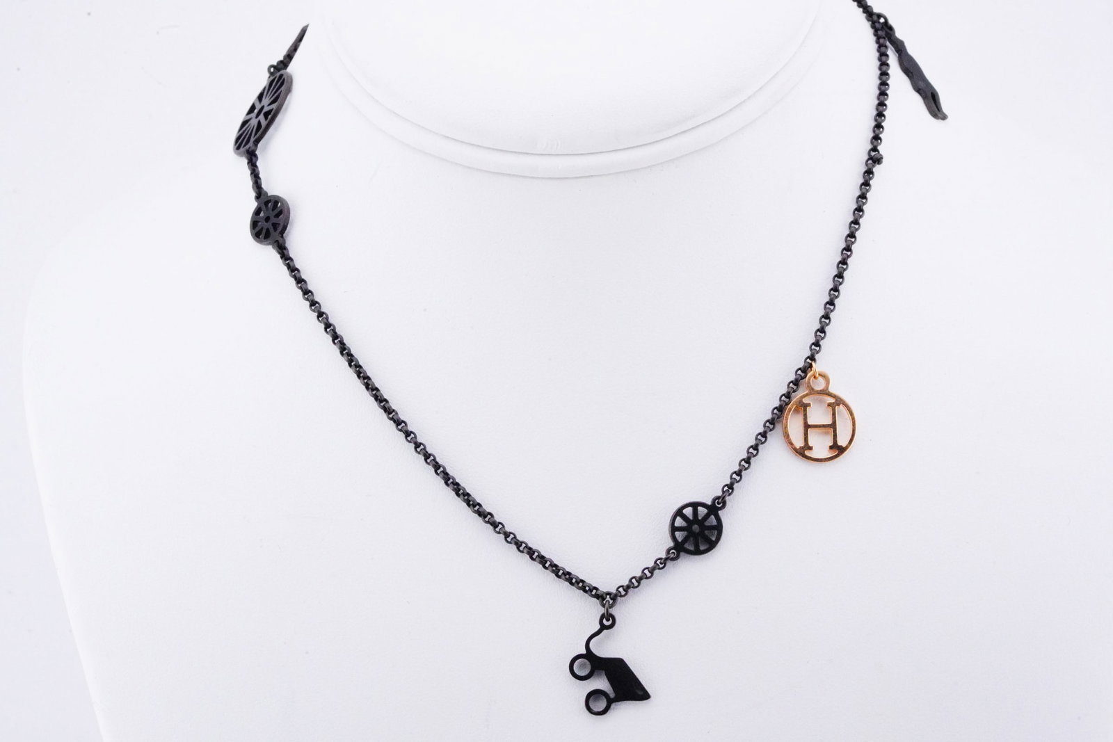 Hermes Black Sterling Silver/18K Charm Necklace: Hermes Solid Matte Black Sterling Silver and 18K Rose Gold Toggle Charm Necklace - This lovely necklace was made by Hermes and is crafted of sterling silver with a matte black finish, and 18k rose gol