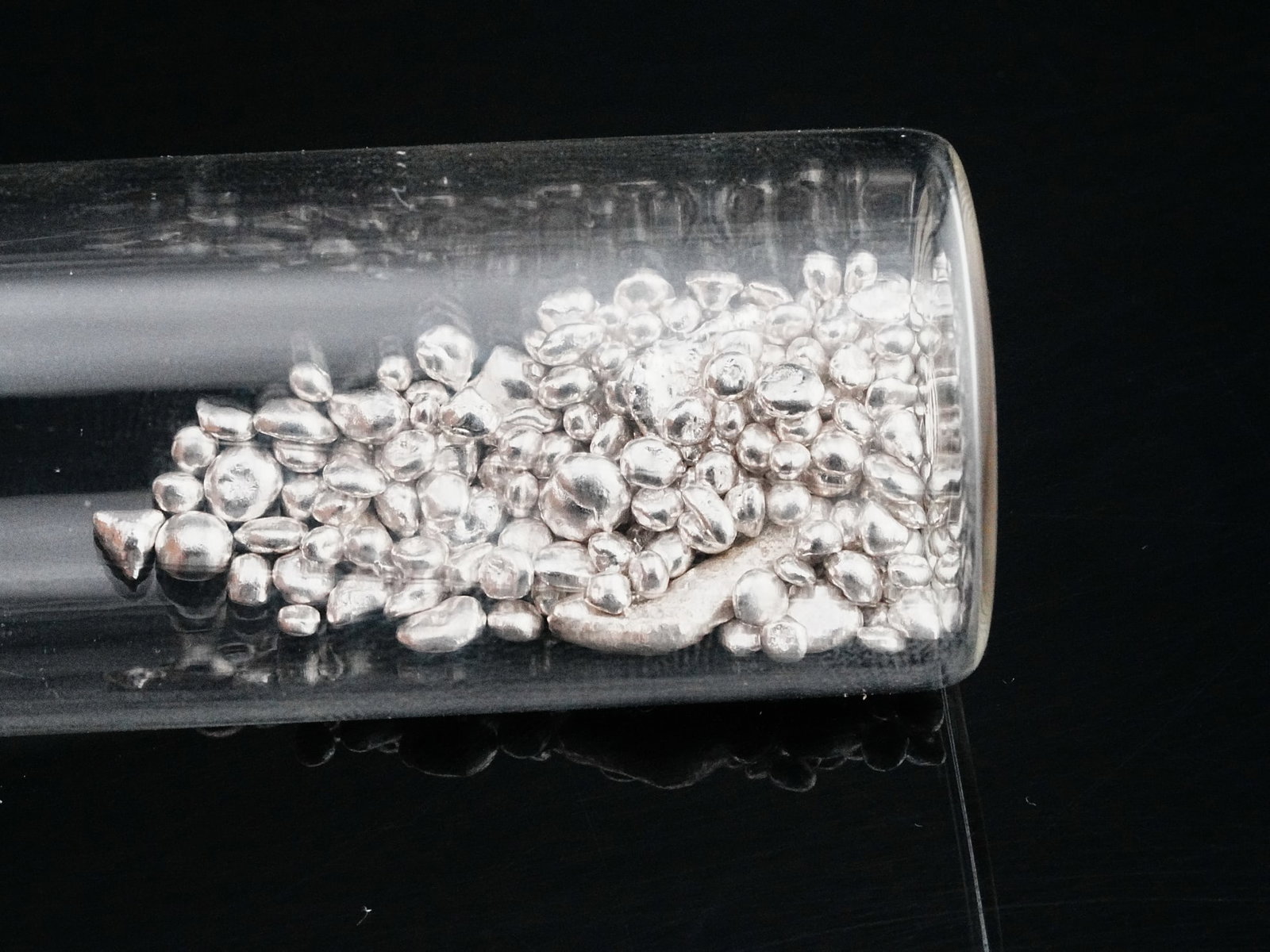24.5 Grams .999 Silver Pellets: 24.5 Grams .999 Silver Pellets - Offered here is a lot of 24.5 grams of .999 fine silver pellets, neatly housed in a clear glass jar for easy storage and display. These bright, high-purity silver pell