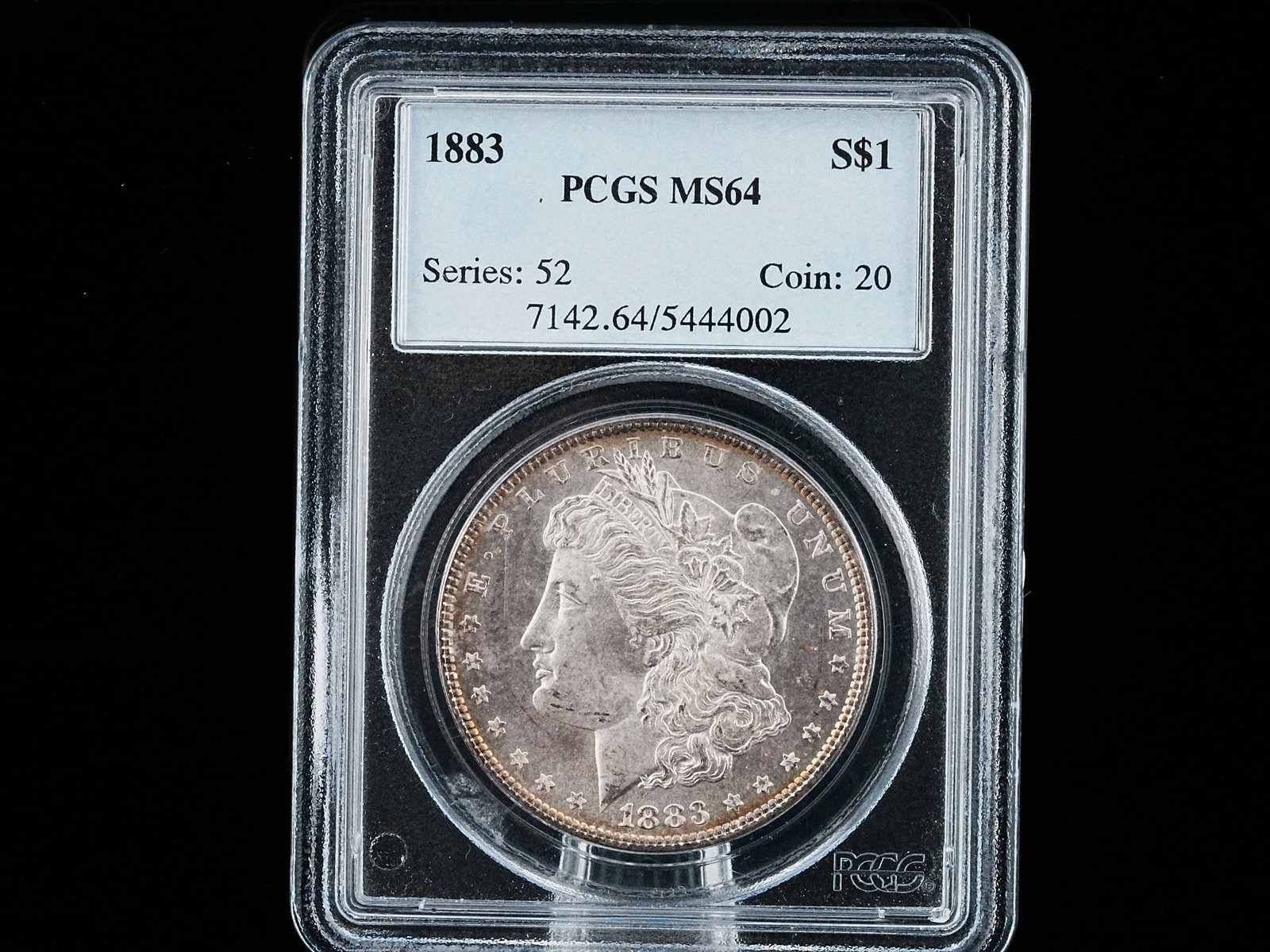 1883-P MS64 Morgan Silver Dollar Series 52 Coin 20 in PCGS Slab: 1883-P MS64 Morgan Silver Dollar Series 52 Coin 20 in PCGS Slab - This 1883-P Morgan Silver Dollar is certified MS64 by PCGS and securely housed in an official PCGS slab. Struck at the Philadelphia Mi