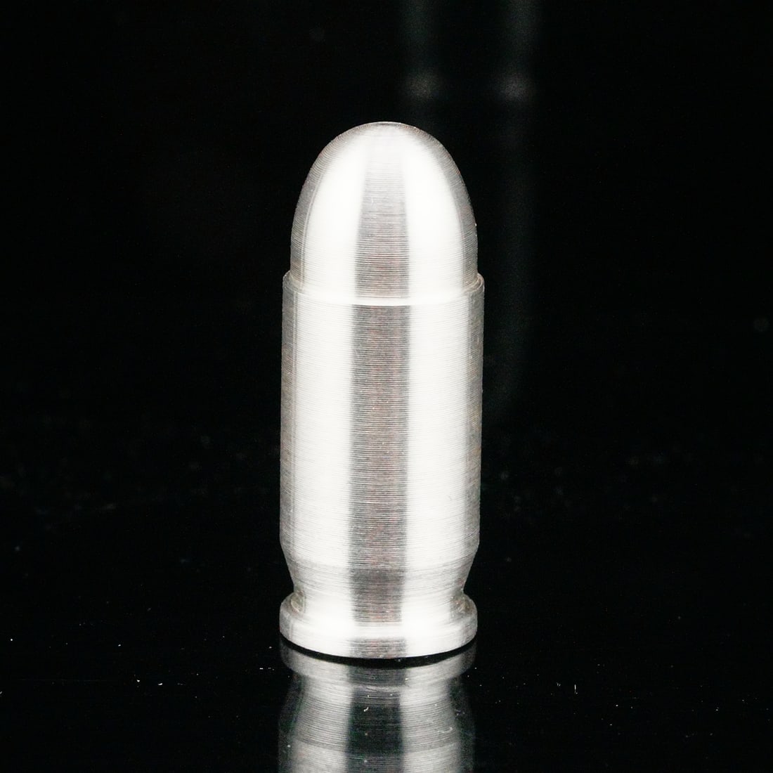 Silvertowne Mint 1 Troy Ounce .999 Silver Bullet: Silvertowne Mint 1 Troy Ounce .999 Fine Silver Bullet .45 Caliber ACP - A 1 troy ounce .999 fine silver bullet produced by Silvertowne Mint, expertly modeled after .45 Automatic Colt Pistol (ACP) ammu