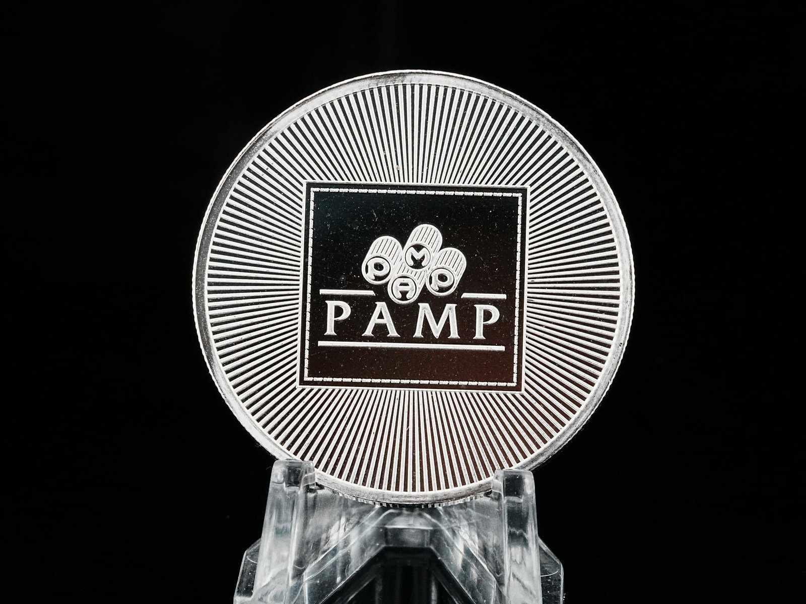 PAMP USA 1 Troy Ounce .999 Fine Silver Bullion Round: PAMP USA 1 Troy Ounce .999 Fine Silver Bullion Round - Enhance your silver holdings with this exceptional 1 oz .999 fine silver round from PAMP, a globally respected name in precious metals. Combining