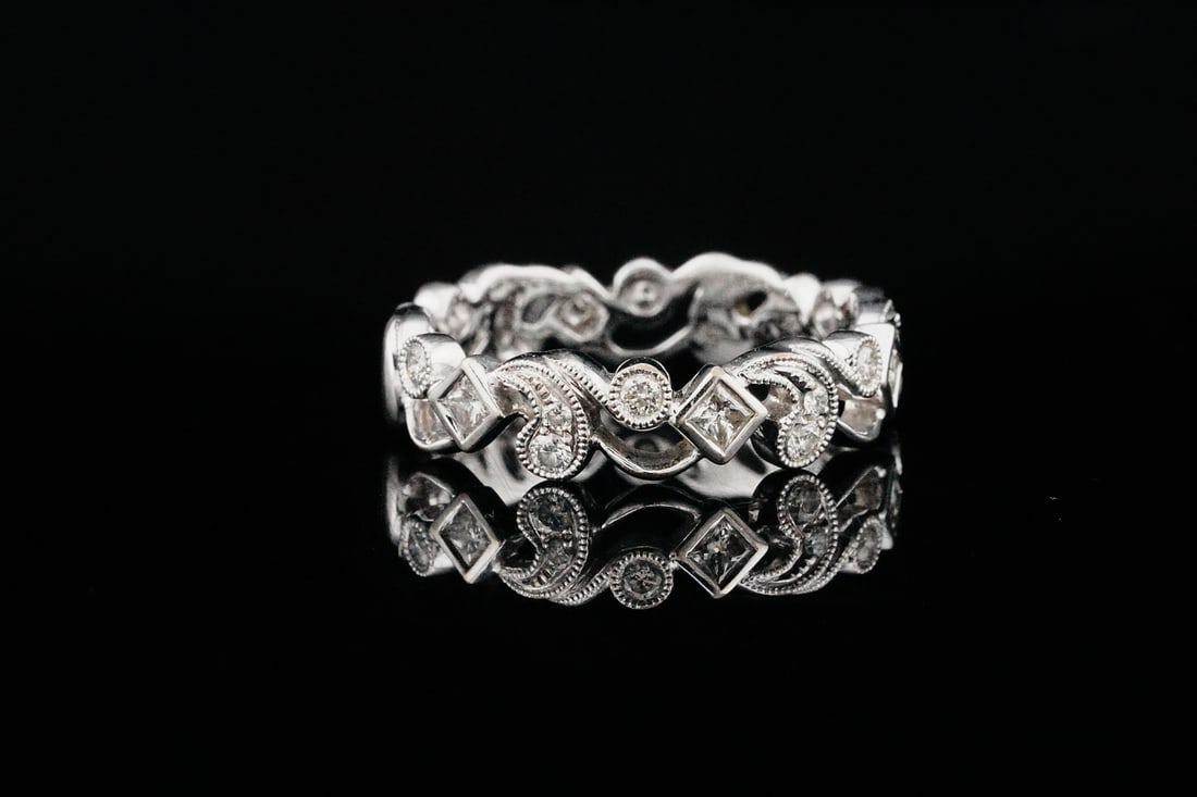 14K White Gold and 0.30ctw Diamond Band: 14K White Gold and 0.30ctw Diamond Band - This elegant band showcases a refined, vintage-inspired design crafted in luminous 14K white gold. Delicately arranged diamonds totaling approximately 0.30