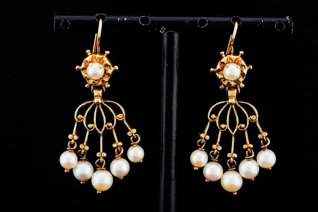 14K Yellow Gold and 4.3mm-5.5mm Pearl 1.75" Earrings: 14K Yellow Gold and 4.3mm-5.5mm Pearl 1.75" Dangle Earrings - These earrings are crafted in 14k yellow gold and are decorated with 4.3mm-5.5mm pearls. Measurements: 1.75" length. Weight: 7.7 grams.