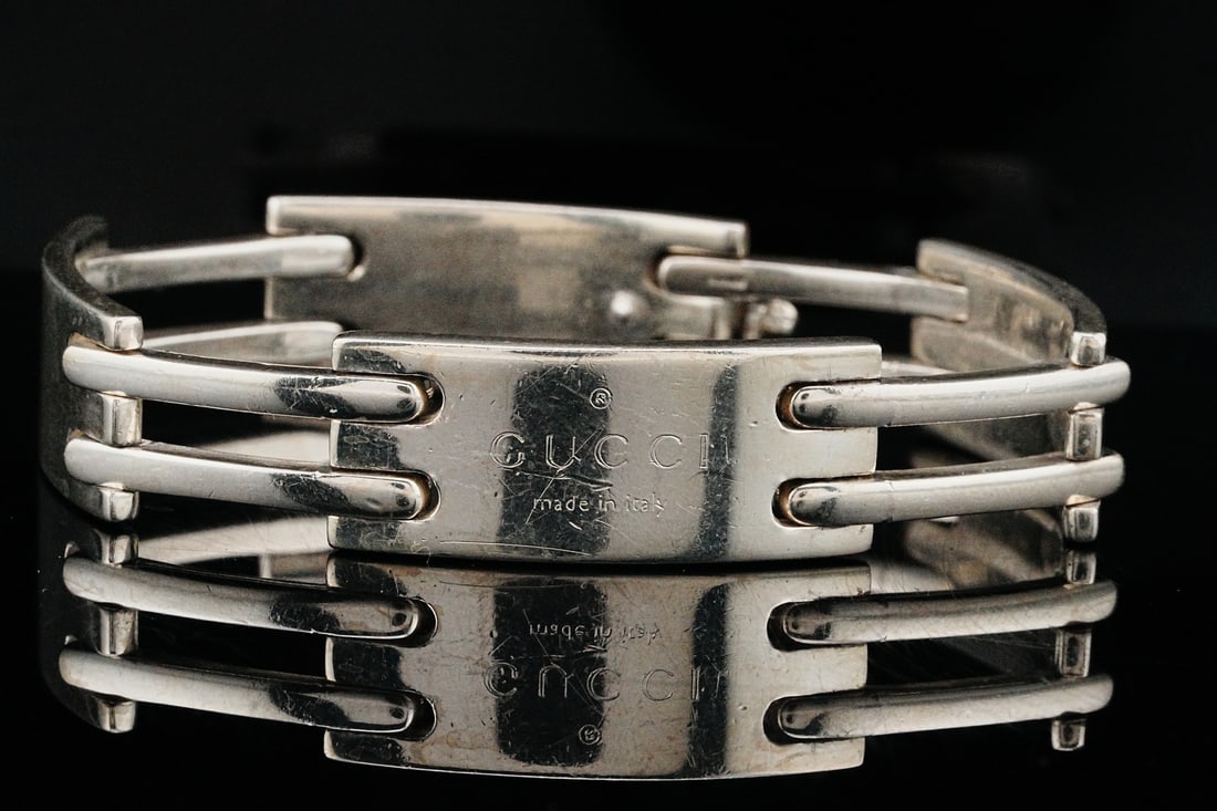 Gucci Solid Sterling Silver 8" Link Bracelet: Gucci Solid Sterling Silver 8" Link Bracelet - This bold and sophisticated bracelet from Gucci showcases the brand's signature blend of modern design and timeless Italian craftsmanship. Crafted from s