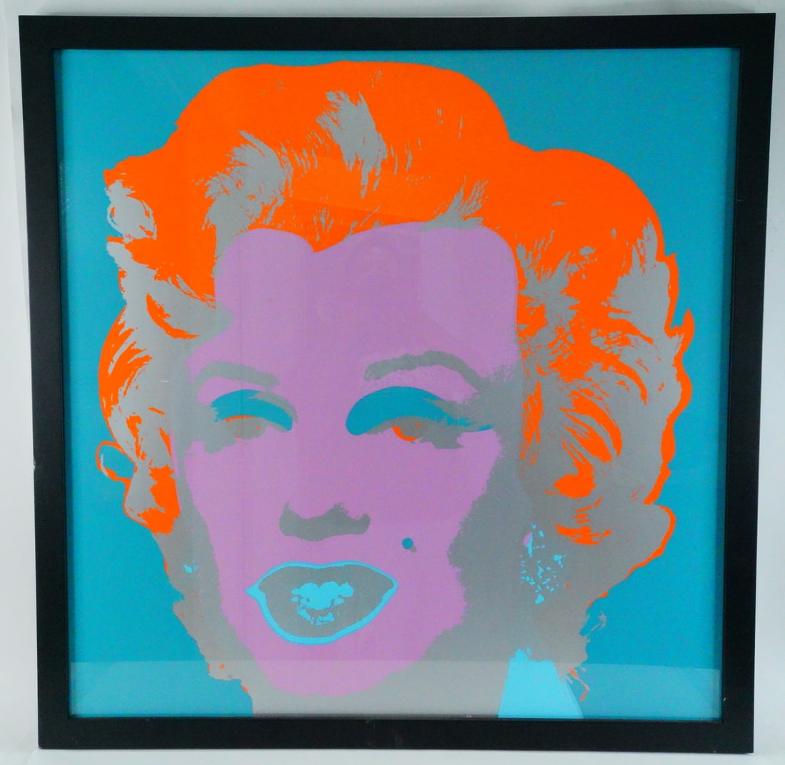 Andy Warhol (After) "Marilyn" Pop Art Screenprint: Andy Warhol (After) "Marilyn" Pop Art Screenprint (Framed) - A striking Pop Art silkscreen print in the style of Andy Warhol, depicting the iconic visage of Marilyn Monroe in bold, saturated colors. T