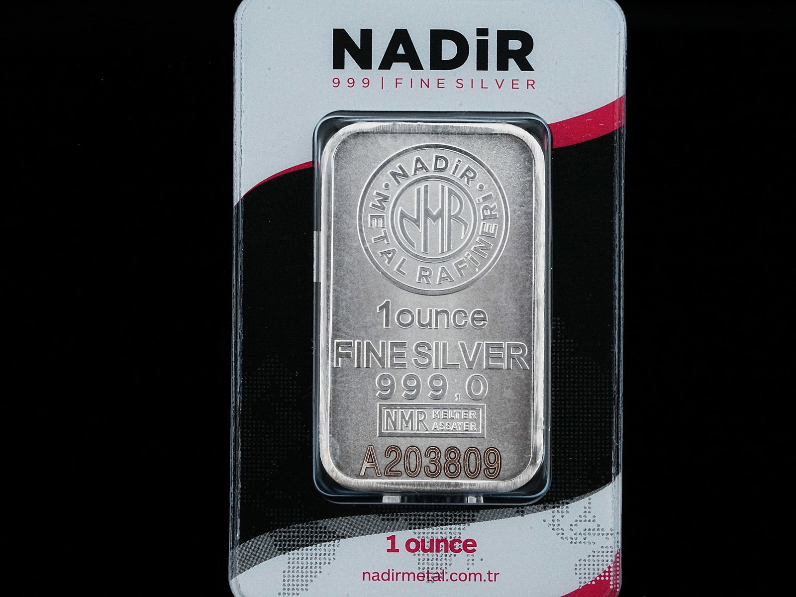 Nadir 1 Oz. .999 Fine Silver Bar in Certicard: Nadir 1 Oz. .999 Fine Silver Bar in Certicard - This bar is made of .999 Fine silver, is housed in a certicard and has a unique serial number. AUCTION NOTE: This item comes from the estate of Prince L