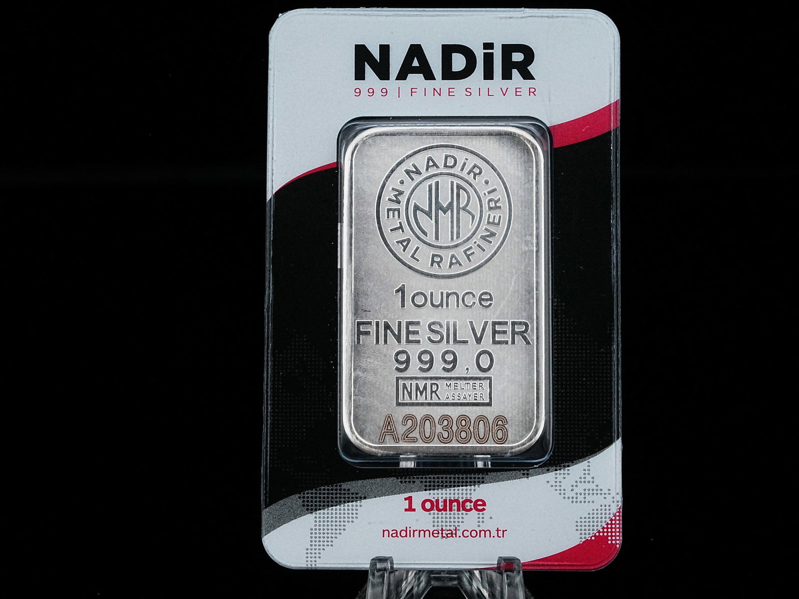 Nadir 1 Oz. .999 Fine Silver Bar in Certicard: Nadir 1 Oz. .999 Fine Silver Bar in Certicard - This bar is made of .999 Fine silver, is housed in a certicard and has a unique serial number. AUCTION NOTE: This item comes from the estate of Prince L