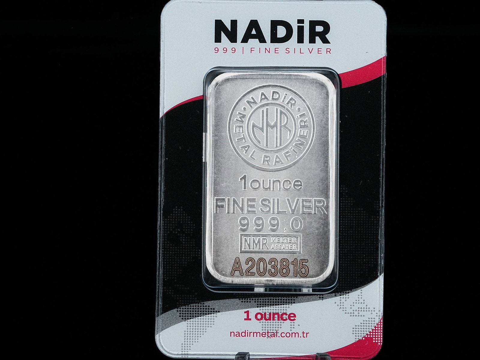 Nadir 1 Oz. .999 Fine Silver Bar in Certicard: Nadir 1 Oz. .999 Fine Silver Bar in Certicard - This bar is made of .999 Fine silver, is housed in a certicard and has a unique serial number. AUCTION NOTE: This item comes from the estate of Prince L