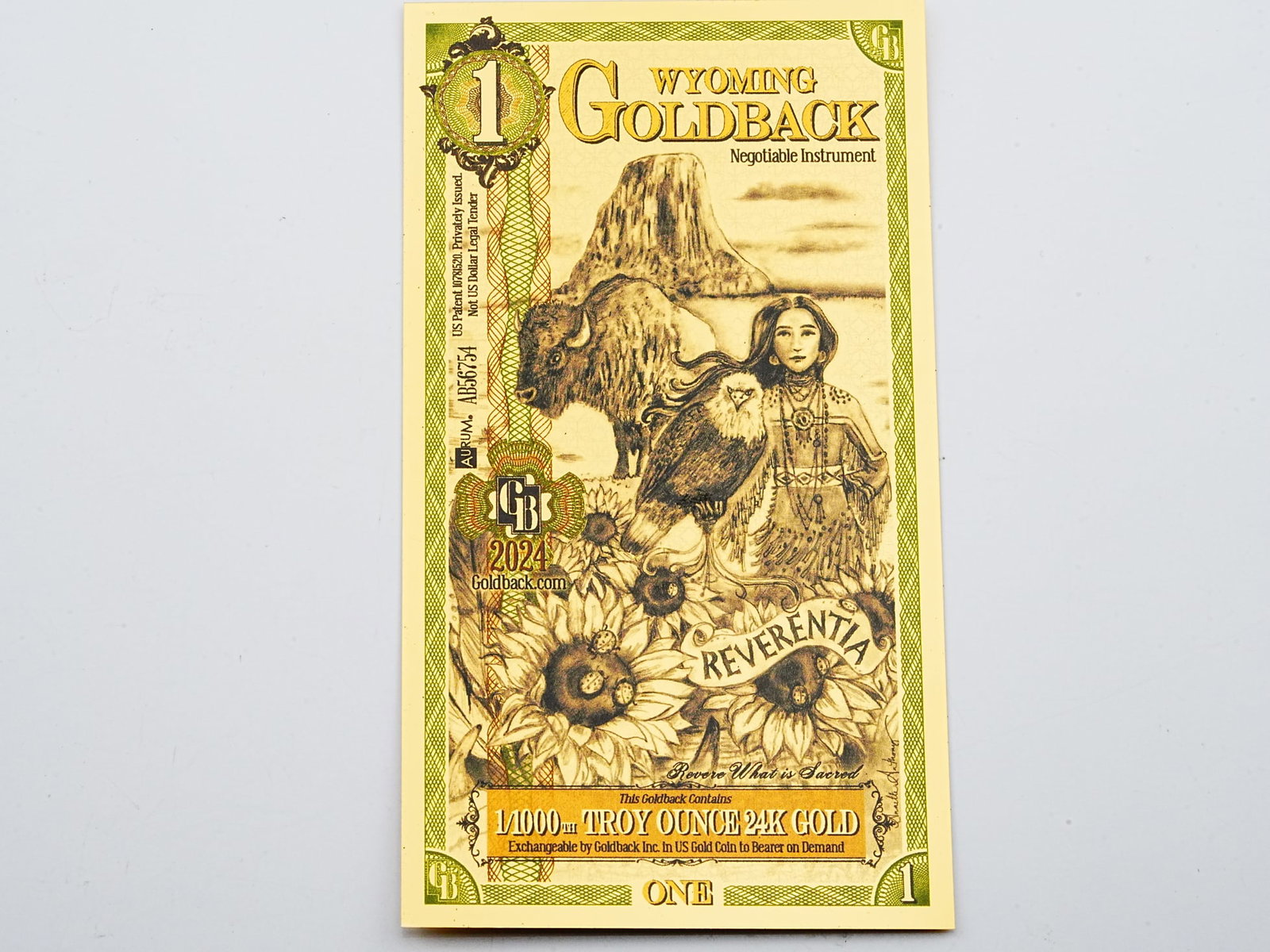 1 Wyoming Goldback 1/1000th Troy Ounce 24K Gold: 1 Wyoming Goldback 1/1000th Troy Ounce 24K Gold - A beautifully designed Wyoming Goldback note containing 1/1000th troy ounce of 24K gold, combining precious metal value with intricate artistic