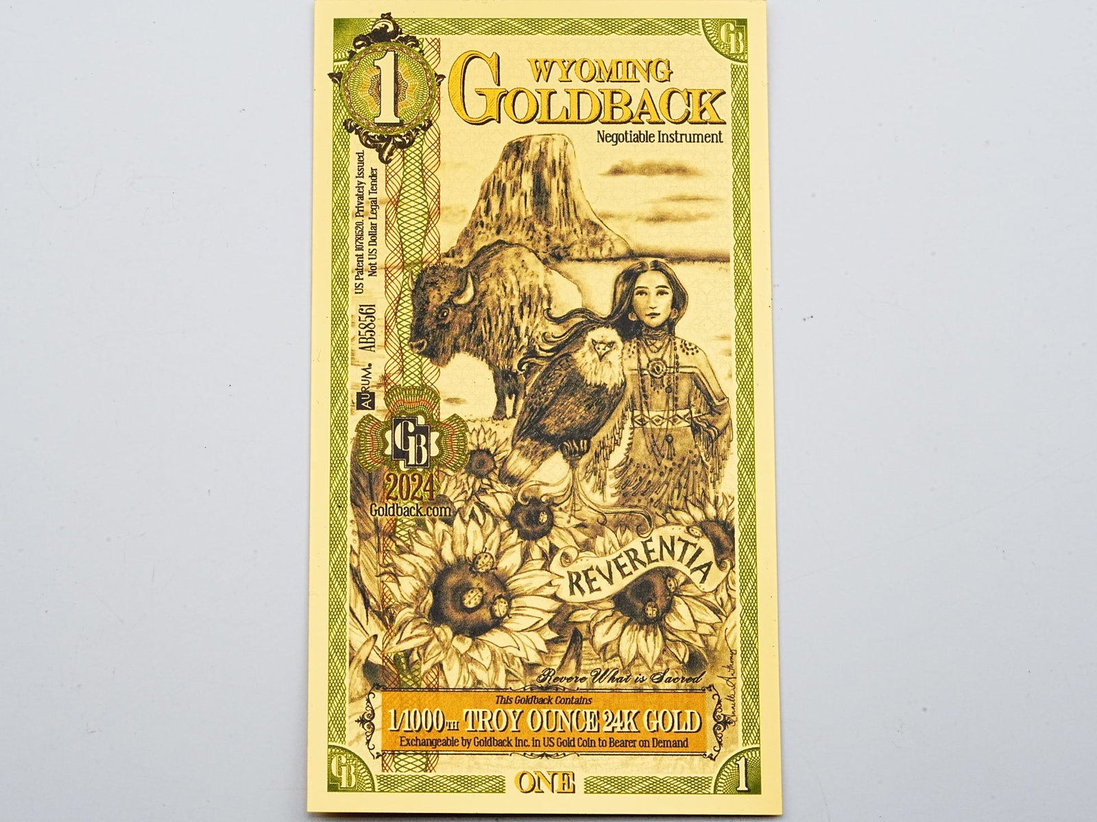 1 Wyoming Goldback 1/1000th Troy Ounce 24K Gold: 1 Wyoming Goldback 1/1000th Troy Ounce 24K Gold - A beautifully designed Wyoming Goldback note containing 1/1000th troy ounce of 24K gold, combining precious metal value with intricate artistic