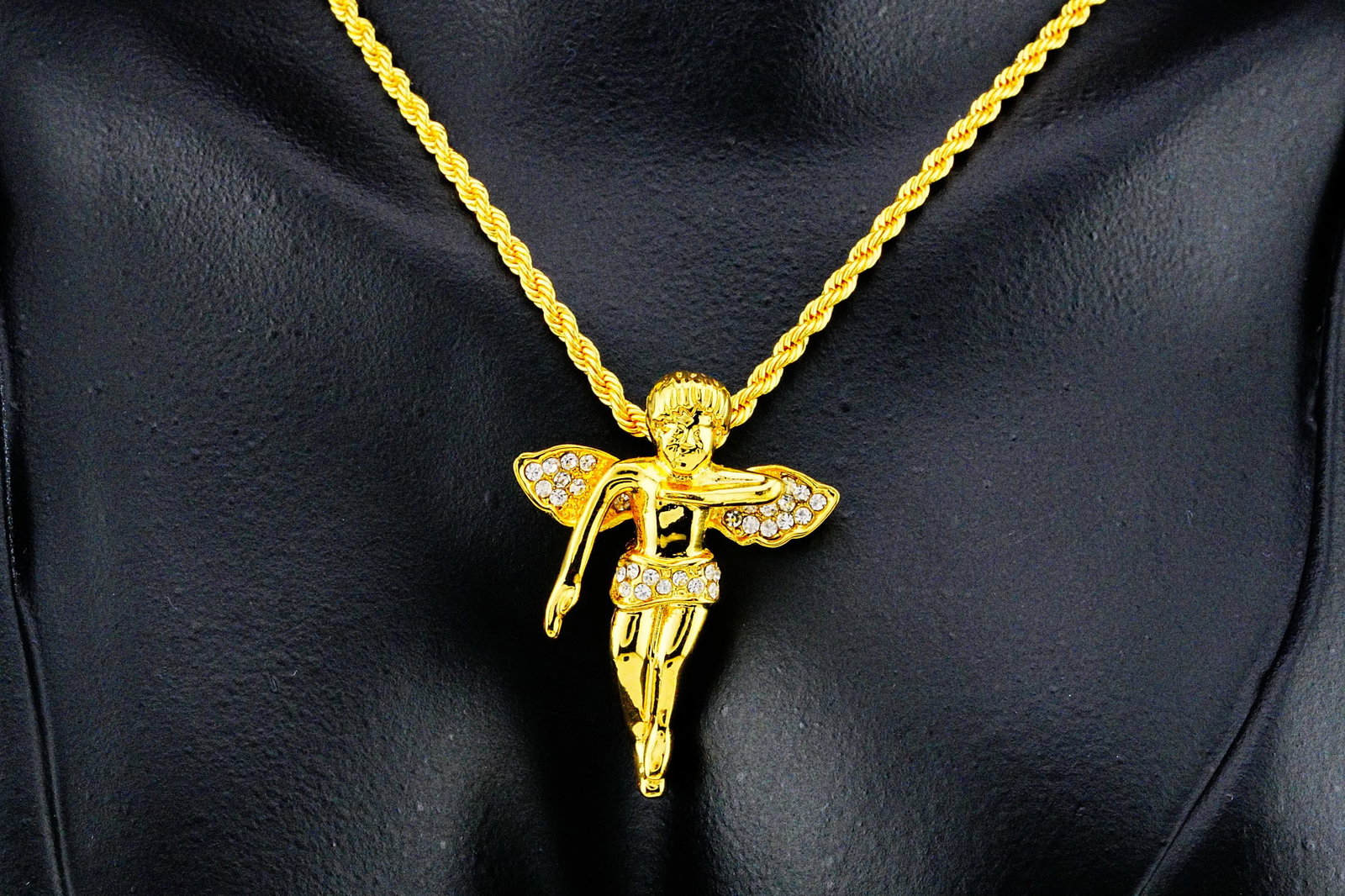 Gold Tone Metal and Crystal 24" Angel Pendant Necklace: Gold Tone Metal and Crystal 24" Angel Pendant Necklace - A graceful and eye-catching necklace featuring a sparkling angel pendant suspended from a classic approximately 24-inch gold tone rope chain.