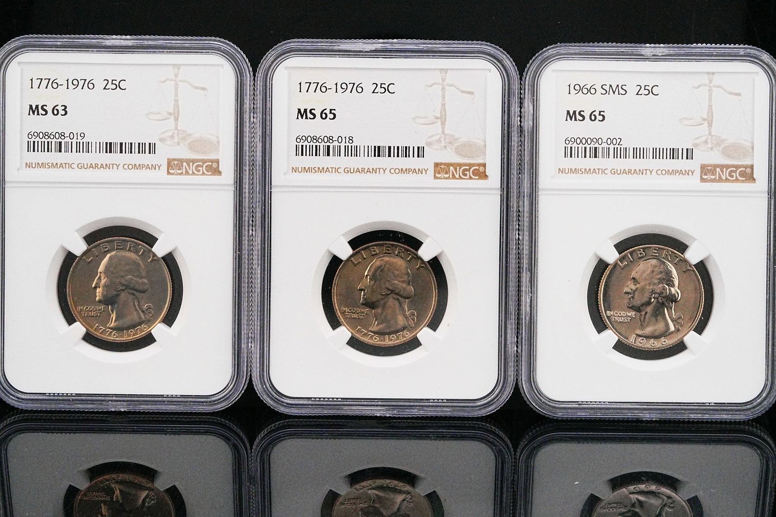 Lot of (3) NGC Certified MS63-65 Washington Quarters: Lot of (3) NGC Certified MS63-65 Washington Quarters - Including 1966 SMS MS65 and Bicentennial Issues. An appealing trio of certified modern United States quarters, this three-coin collection brings 