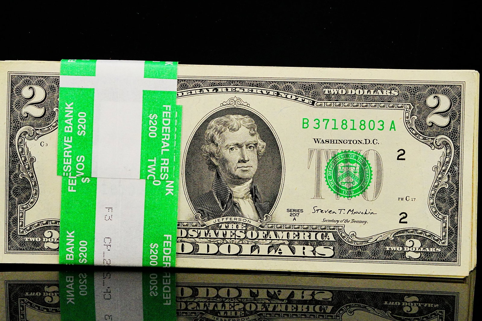 (100) $2 Bills in Mint Condition in Numeric Order: (100) $2 Bills in Mint Condition in Numeric Order - This lot consists of one hundred (100) United States $2 bills, all offered in mint condition and arranged in consecutive numeric (sequential) order.