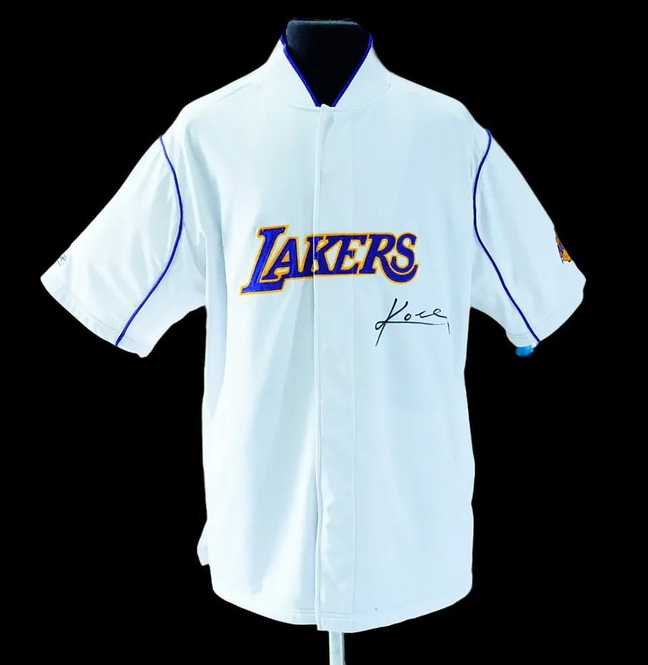 Kobe Bryant 2004-06 Signed LA Lakers Warm-Up Jacket: Kobe Bryant 2004-06 Signed Los Angeles Lakers Warm-Up Jacket (MEARS Authentic) - An exceptional piece of modern basketball memorabilia tied to one of the most iconic figures in NBA history, this authe