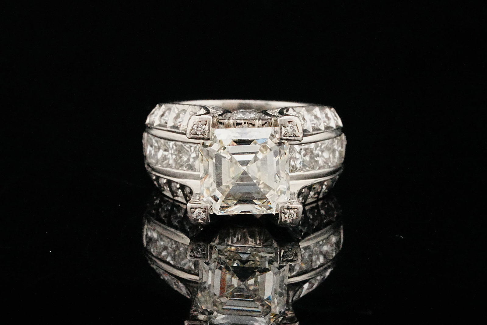 Claude Thibaudeau 7.91ctw Diamond and Platinum Ring: Claude Thibaudeau 7.91ctw VVS-VS1/G-J Diamond and Platinum Custom Asscher Cut Engagement Ring (EGL Certified 4.14ct Center) - A masterwork of bespoke haute joaillerie, this extraordinary custom handma