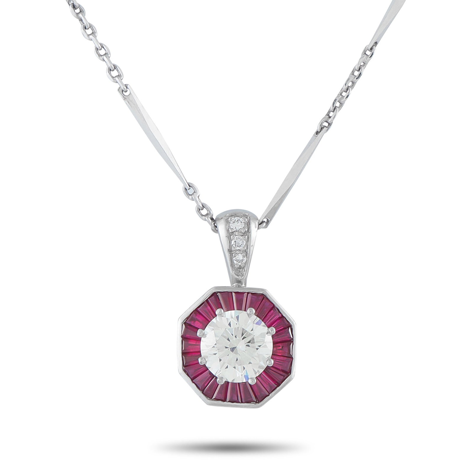 2.20ct SI1/K Diamond, 1.90ctw Ruby and Platinum Necklace: 2.20ct SI1/K Diamond, 1.90ctw Ruby and Platinum 16" Necklace - Chic, sophisticated, and rich with timeless elegance, this striking pendant necklace showcases a captivating interplay of brilliance and 