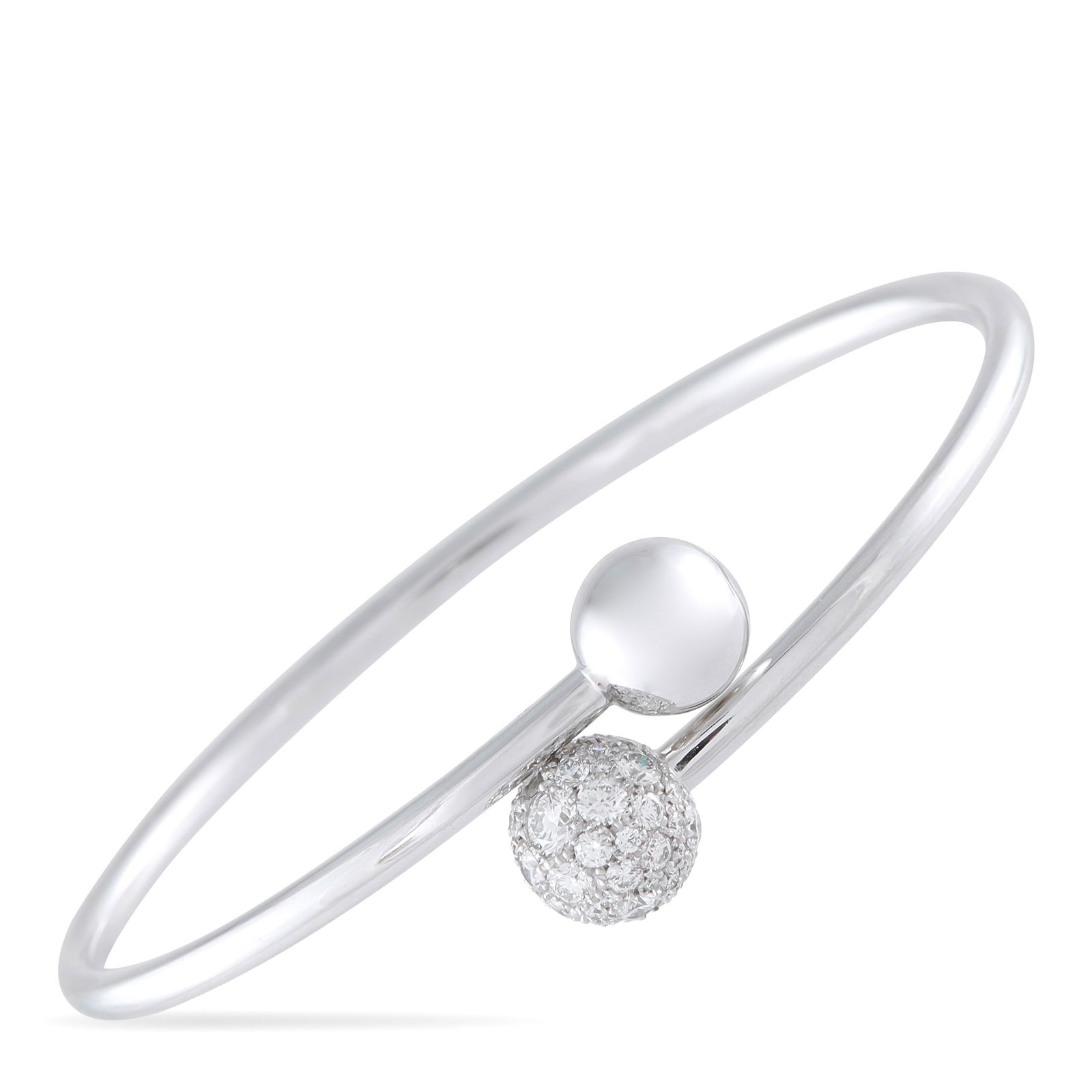 Tiffany & Co. HardWear 0.73ctw Diamond and 18K Bangle: Tiffany & Co. HardWear 0.73ctw Diamond and 18K White Gold Ball Bypass Bangle Bracelet - A modern icon of effortless sophistication, this Tiffany & Co. HardWear bangle bracelet captures the bold, archi