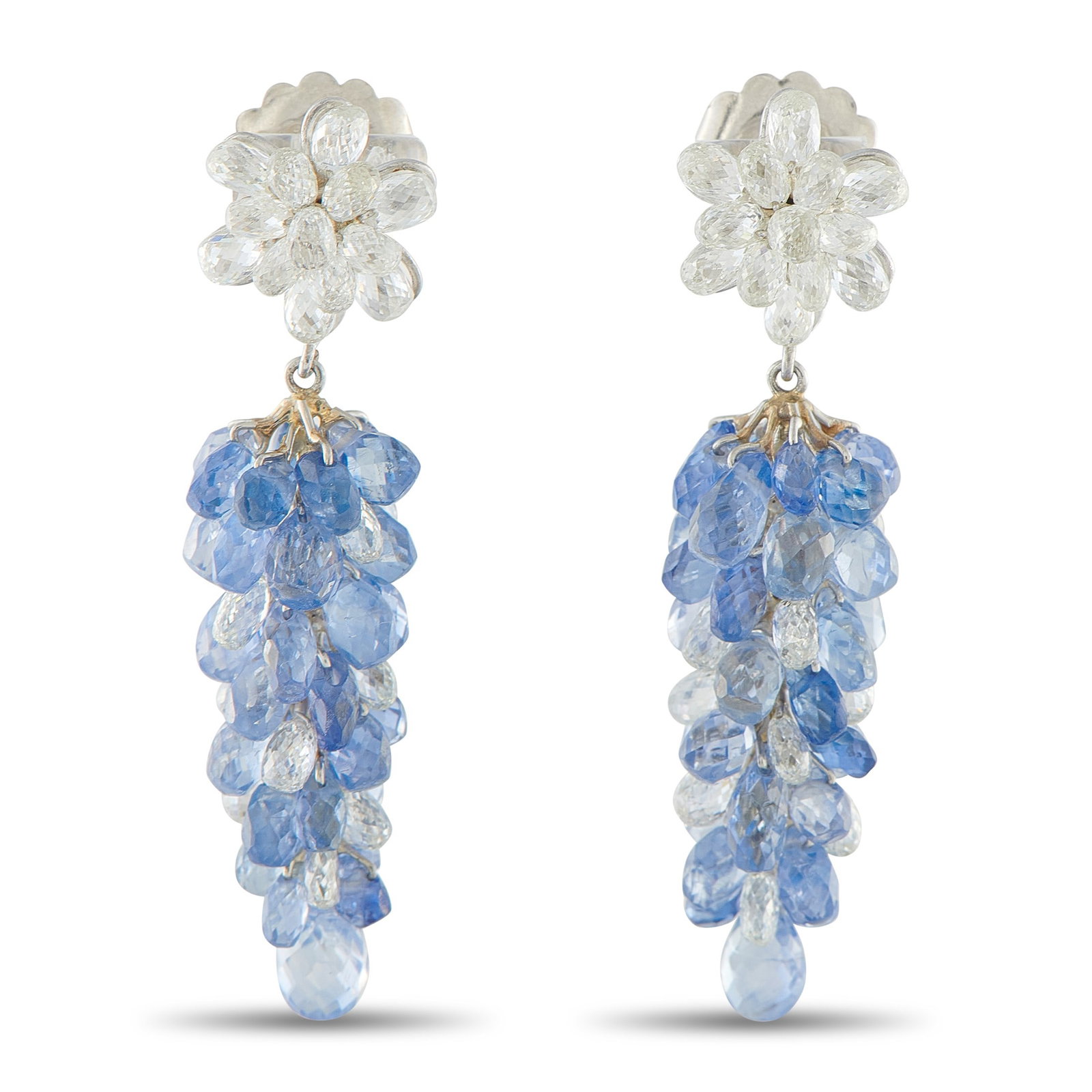 17.50ctw Blue Sapphire, 5.00ctw Diamond, 18K Earrings: 17.50ctw Blue Sapphire, 5.00ctw Diamond and 18K White Gold 2.75" Dangle Earrings - These elegant dangle earrings showcase a graceful and eye-catching design. Crafted in 18K white gold, the earrings fe
