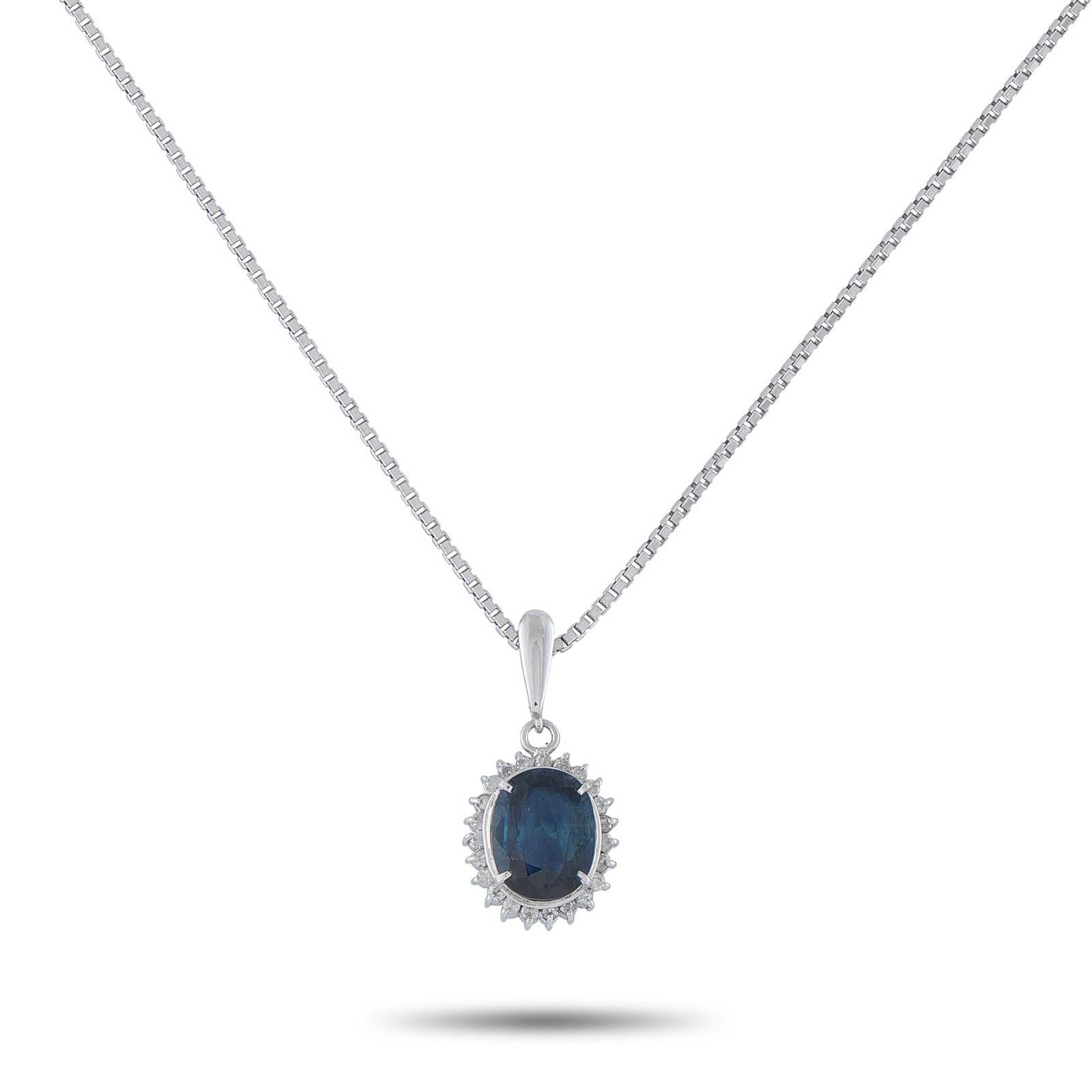 2.25ct Blue Sapphire, Diamond and Platinum Necklace: 2.25ct Blue Sapphire, 0.15ctw Diamond and Platinum 15.5" Pendant Necklace - Timeless elegance defines this classic pendant necklace, centered around an approximately 2.25-carat blue sapphire that offe