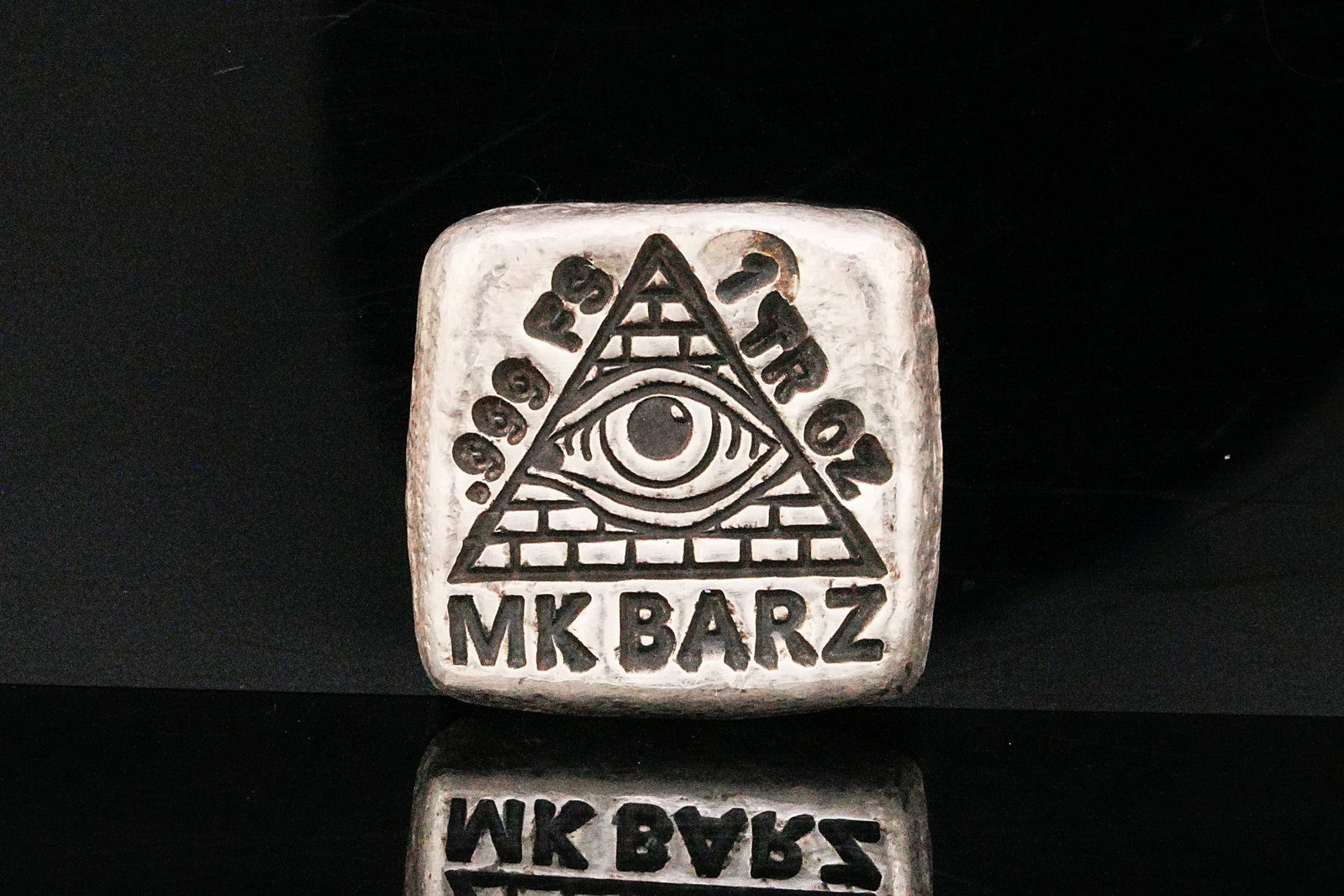 MK Barz 1 Troy Oz .999 Fine Silver Hand-Poured Art Bar: MK Barz 1 Troy Ounce .999 Fine Silver Hand-Poured Art Bar - Eye of Providence Design - A distinctive hand-poured silver art bar from MK Barz, struck in 1 troy ounce of .999 fine silver. This compact s