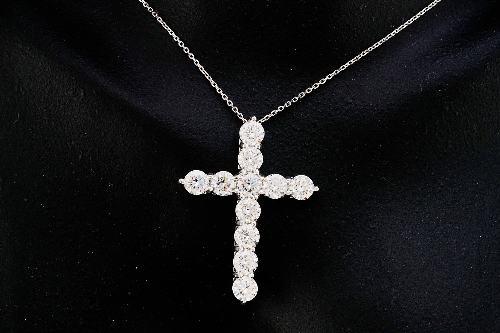 4.30ctw VS2-SI1/G-H Diamond and 14K Cross Necklace: 4.30ctw VS2-SI1/G-H Diamond and 14K White Gold 17" Cross Pendant Necklace - THIS ITEM WILL COME WITH A $21,000 INSURANCE VALUATION REPORT. Beautifully crafted in polished 14K white gold, this elegant 