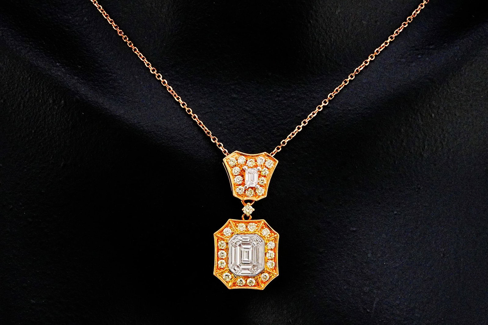 1.40ctw VS1-SI1 White and Yellow Diamond 18K Necklace: 1.40ctw VS1-SI1 White and Yellow Diamond 18K Rose/Yellow Gold 18" Necklace - THIS ITEM WILL COME WITH A $12,500 INSURANCE VALUATION REPORT. An exquisite display of geometric elegance and contemporary 