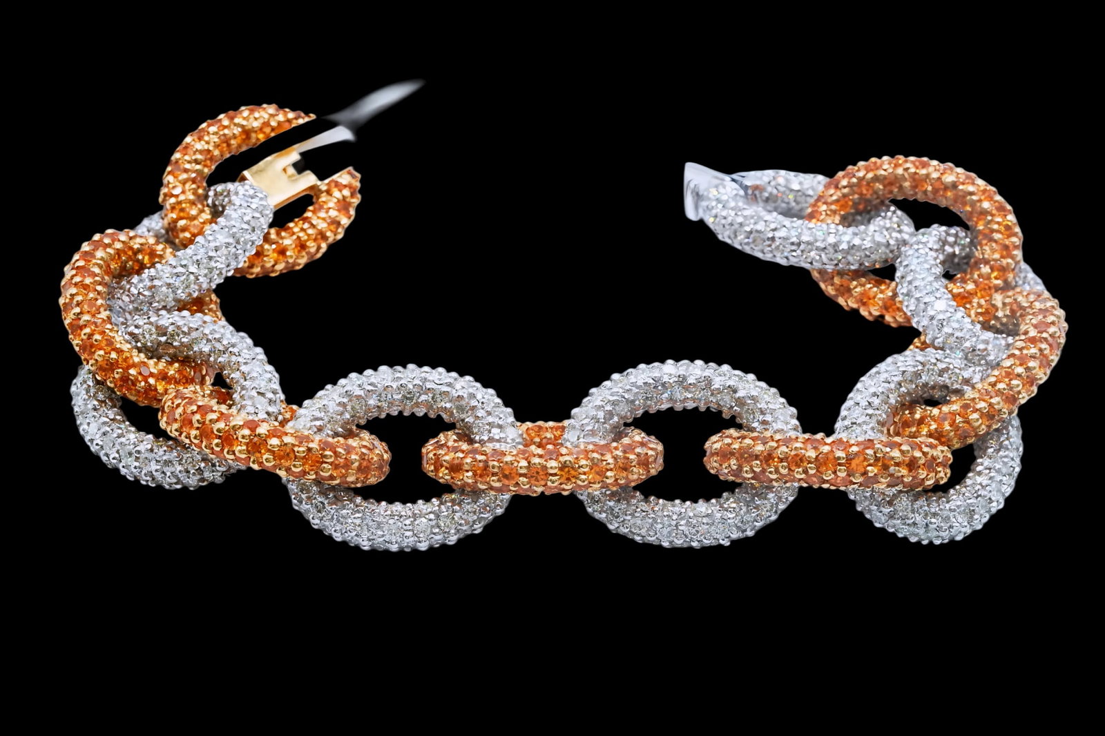 27.85ctw Yellow Sapphire, 20.90ctw Diamond 18K Bracelet: 27.85ctw Yellow Sapphire, 20.90ctw VS1-SI1/G-H Diamond and 18K Yellow/White Gold 7.5" Bracelet - THIS ITEM WILL COME WITH A $71,500 INSURANCE VALUATION REPORT. This striking bracelet is crafted in a b