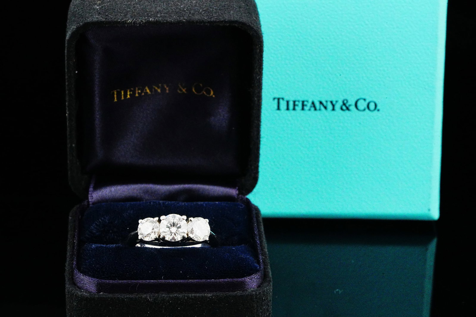 Tiffany & Co. 2.50ctw Diamond and Platinum Ring: Tiffany & Co. 2.50ctw VVS/E-F Diamond and Platinum 3-Stone Ring W/Box - A timeless symbol of elegance and commitment, this exquisite three-stone ring by Tiffany & Co. is crafted in platinum and set wi