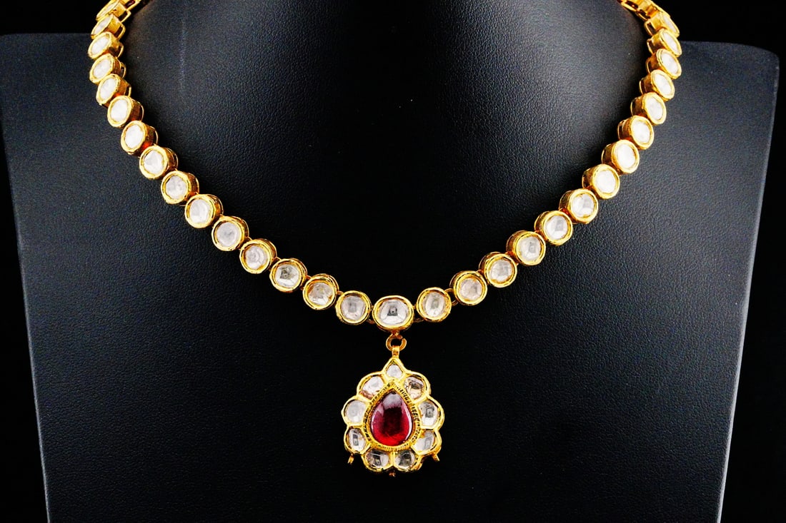 Handmade 6.00ctw Polki Diamond, 2.00ct Ruby and 22K Necklace: Handmade 6.00ctw Polki Diamond, 2.00ct Cabochon Ruby and 22K Yellow Gold Necklace - THIS ITEM WILL COME WITH A $28,000 INSURANCE VALUATION REPORT. A striking example of traditional craftsmanship, this
