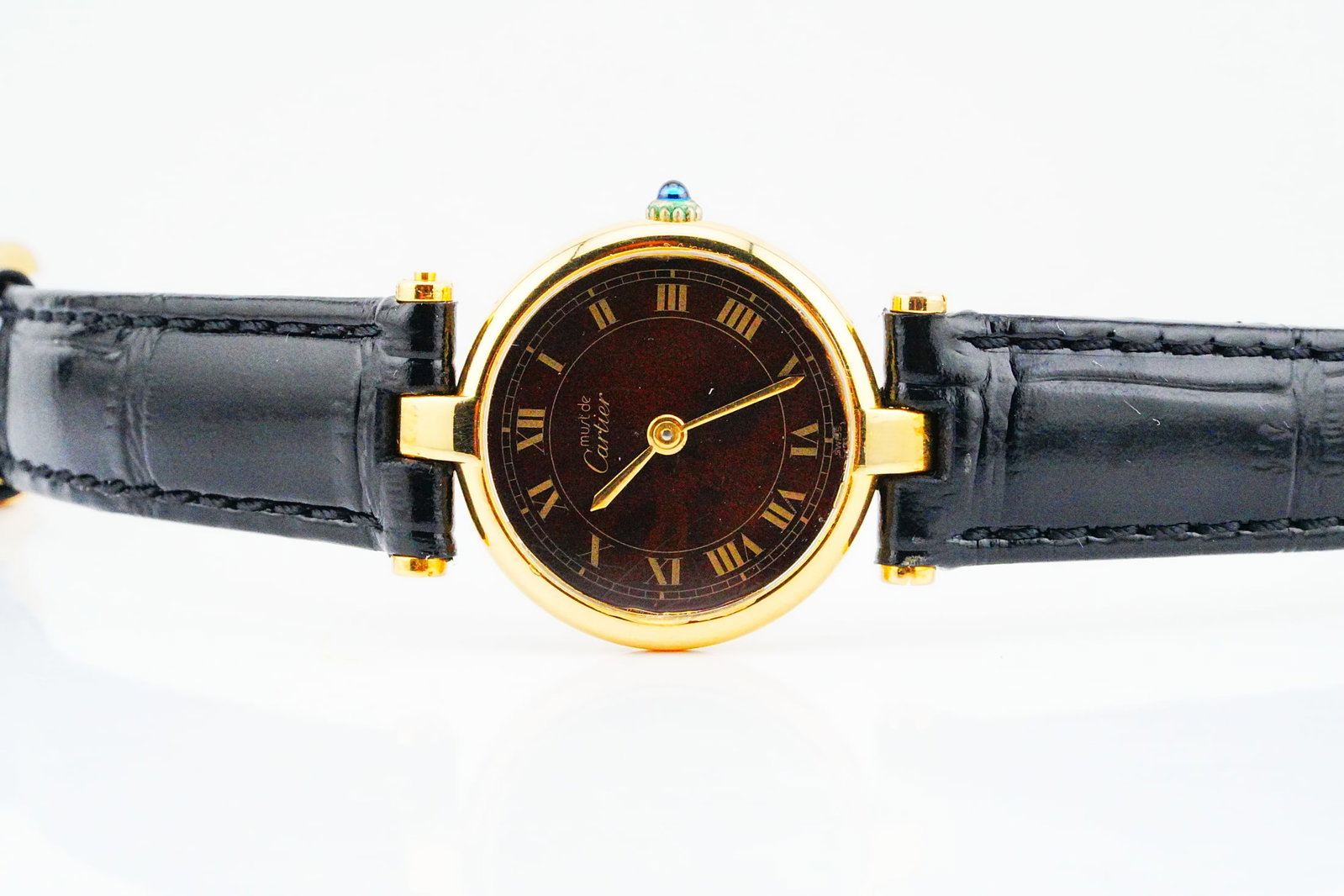 Cartier Must de Cartier Vendome Dark Chocolate Dial Watch: Cartier Must de Cartier Vendome Dark Chocolate Roman Dial Vermeil Quartz Watch (590004) - Elegant and understated, this Cartier Must de Cartier Vendome features a rich dark chocolate brown dial with R