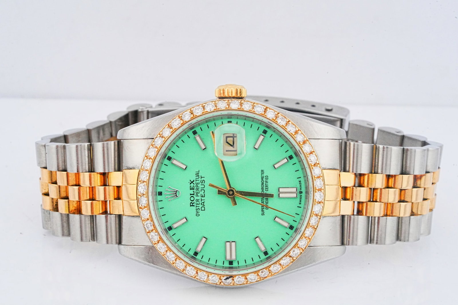 Rolex Datejust 36mm Two-Tone Vintage Watch Ref. 16233: Rolex Oyster Perpetual Datejust 36mm 18K Yellow Gold and Stainless Steel Vintage Watch W/Custom Dial and Diamond Bezel (Ref. 16233) - A classic vintage Rolex Datejust. The watch features the iconic 36